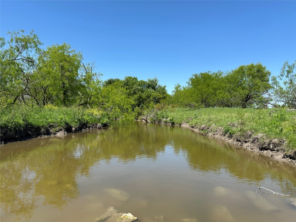 8500 North Fork Road Bartlett, TX 76511 - Photo 1 of 25 a view of a lake with houses in the background
