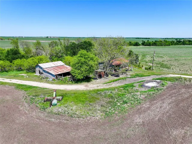 a view of a lake with a yard