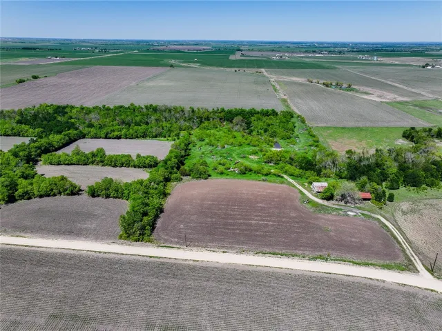a view of a lake with a yard