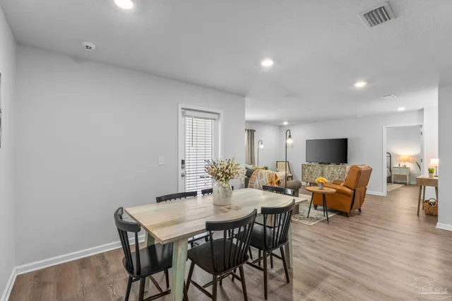 a view of a dining room with furniture