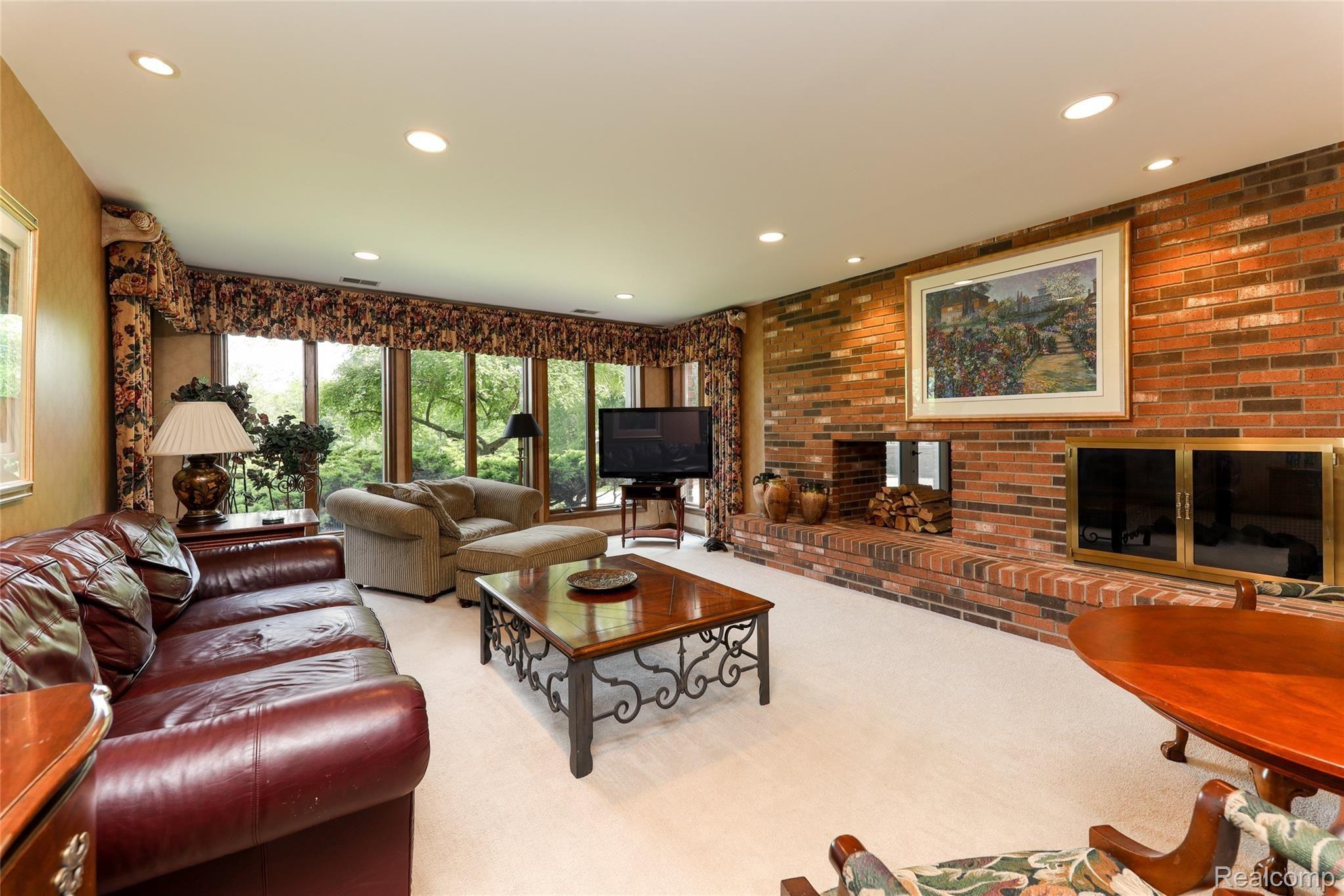 50450 Hanford Road Canton, MI 48187 - Photo 61 of 85 Fully finished walk-out basement with wall of windows and recessed lights.