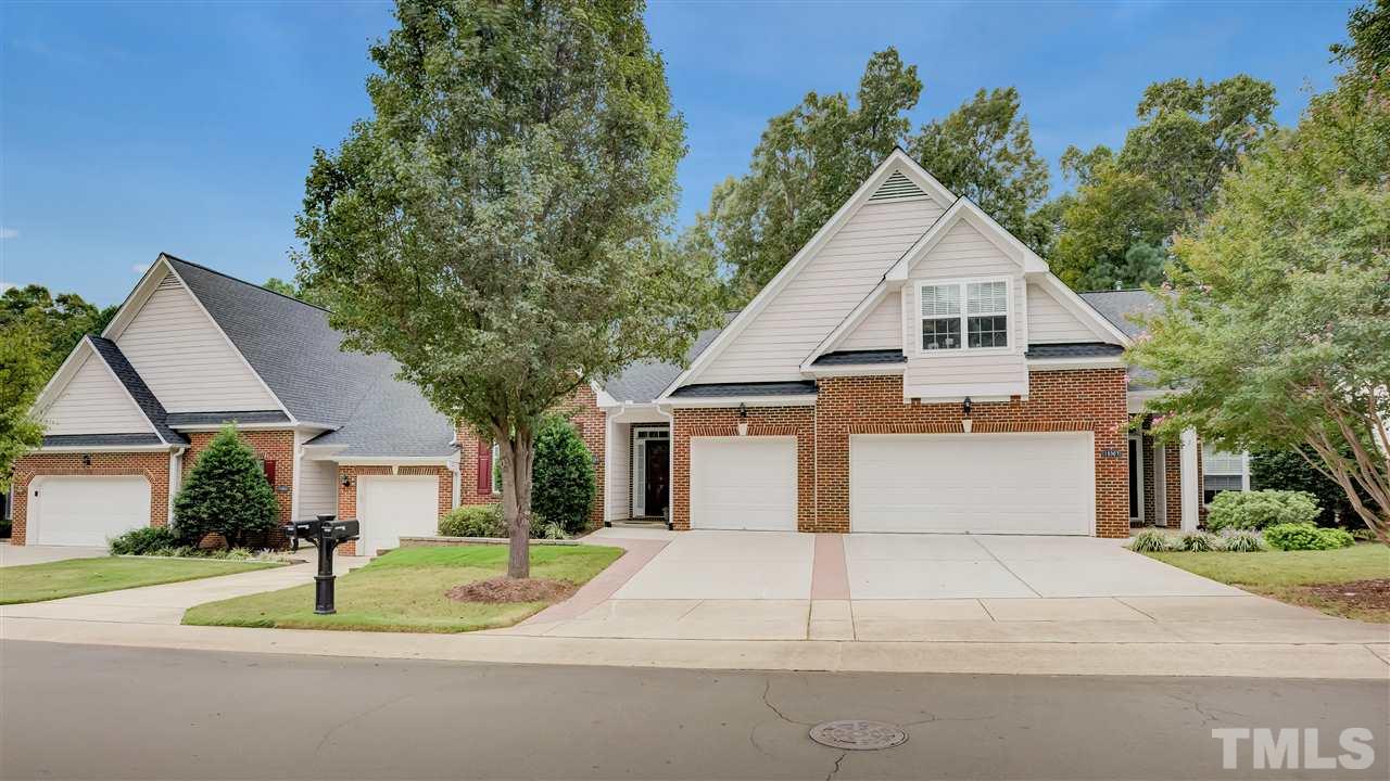 10305 Dapping Drive Raleigh, NC 27614 - Photo 1 of 30 a front view of a house with a yard and garage