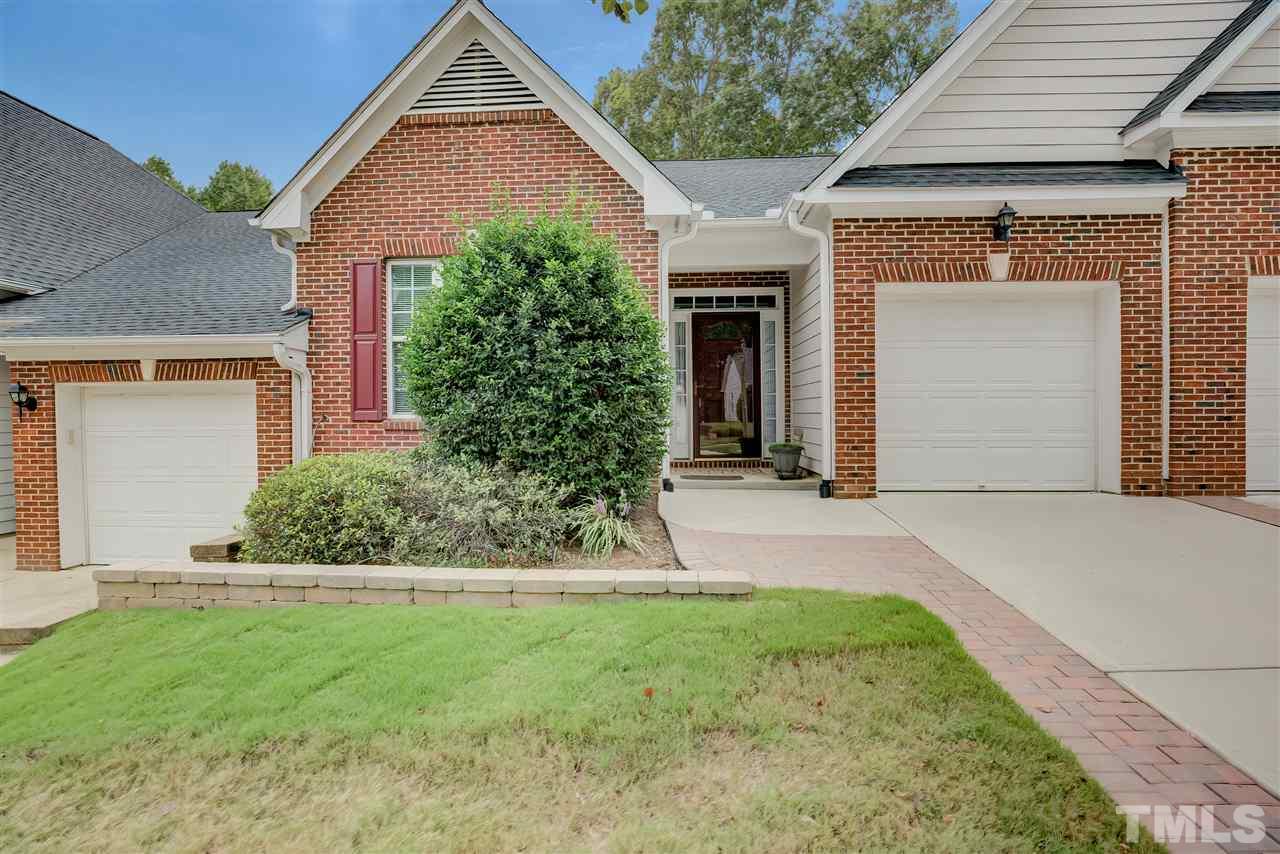 10305 Dapping Drive Raleigh, NC 27614 - Photo 2 of 30 a front view of a house with a yard and garage