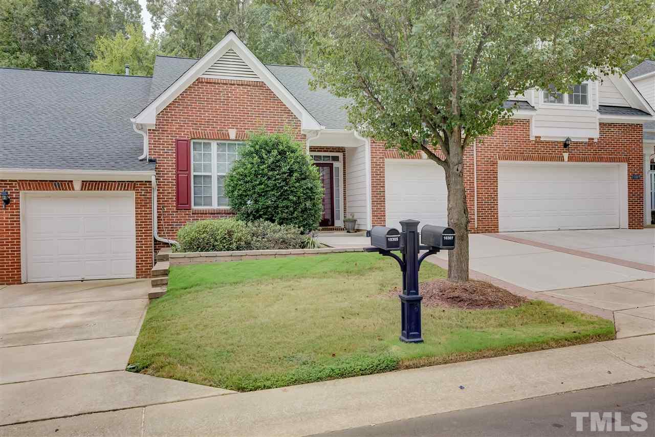 10305 Dapping Drive Raleigh, NC 27614 - Photo 3 of 30 a front view of a house with garden