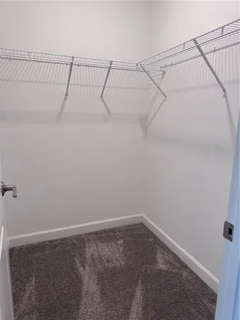 a view of a room with racks on the wall