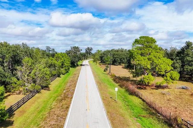 a view of swimming pool with a yard