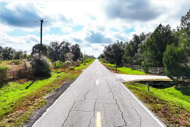 a view of swimming pool with a yard