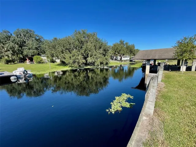 a view of a lake with a garden