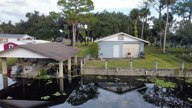 a view of a chairs and table in the house