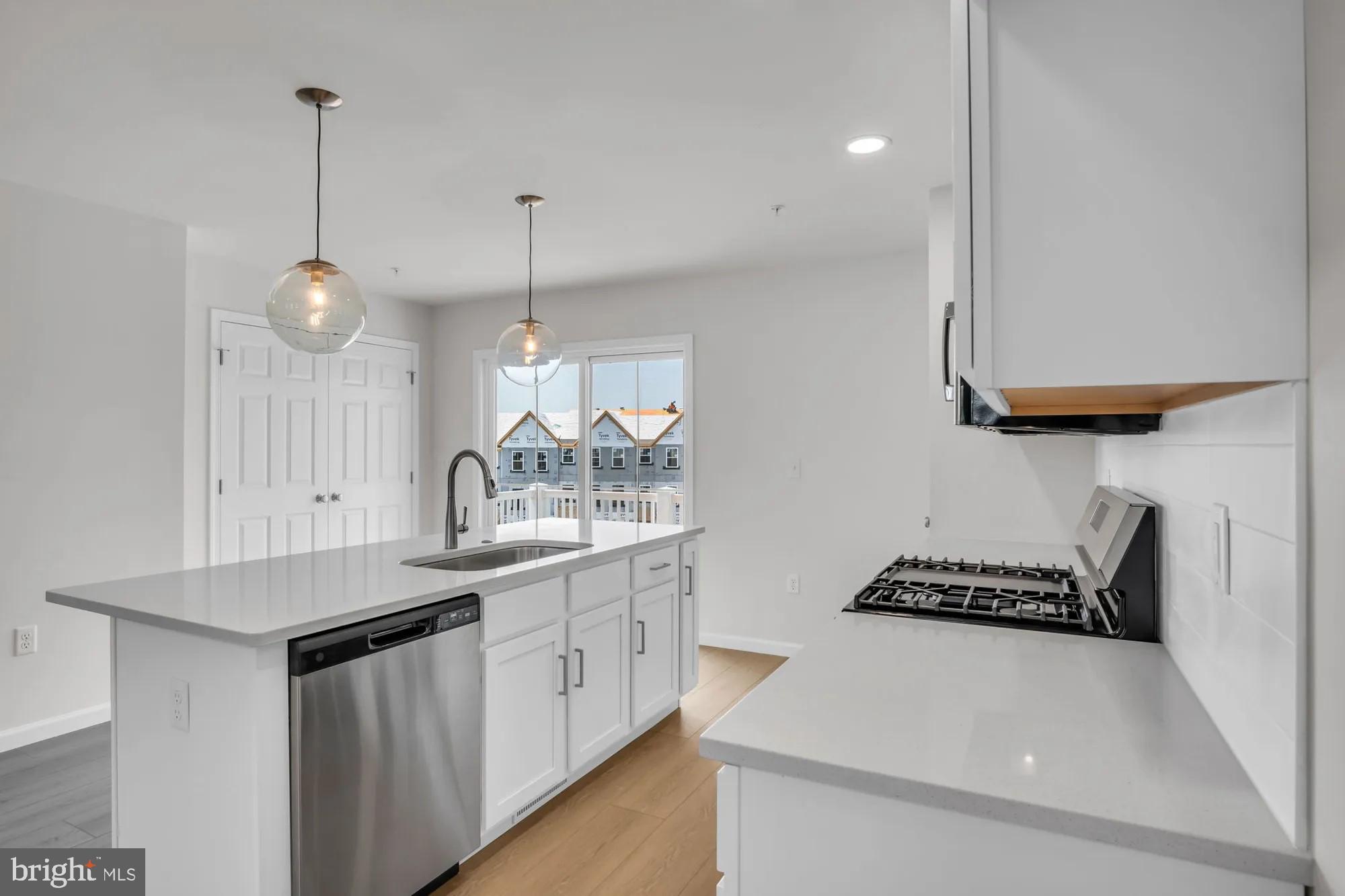 4 Morgan Circle, Unit 1303 Carlisle, PA 17013 - Photo 3 of 13 a kitchen with sink and cabinets