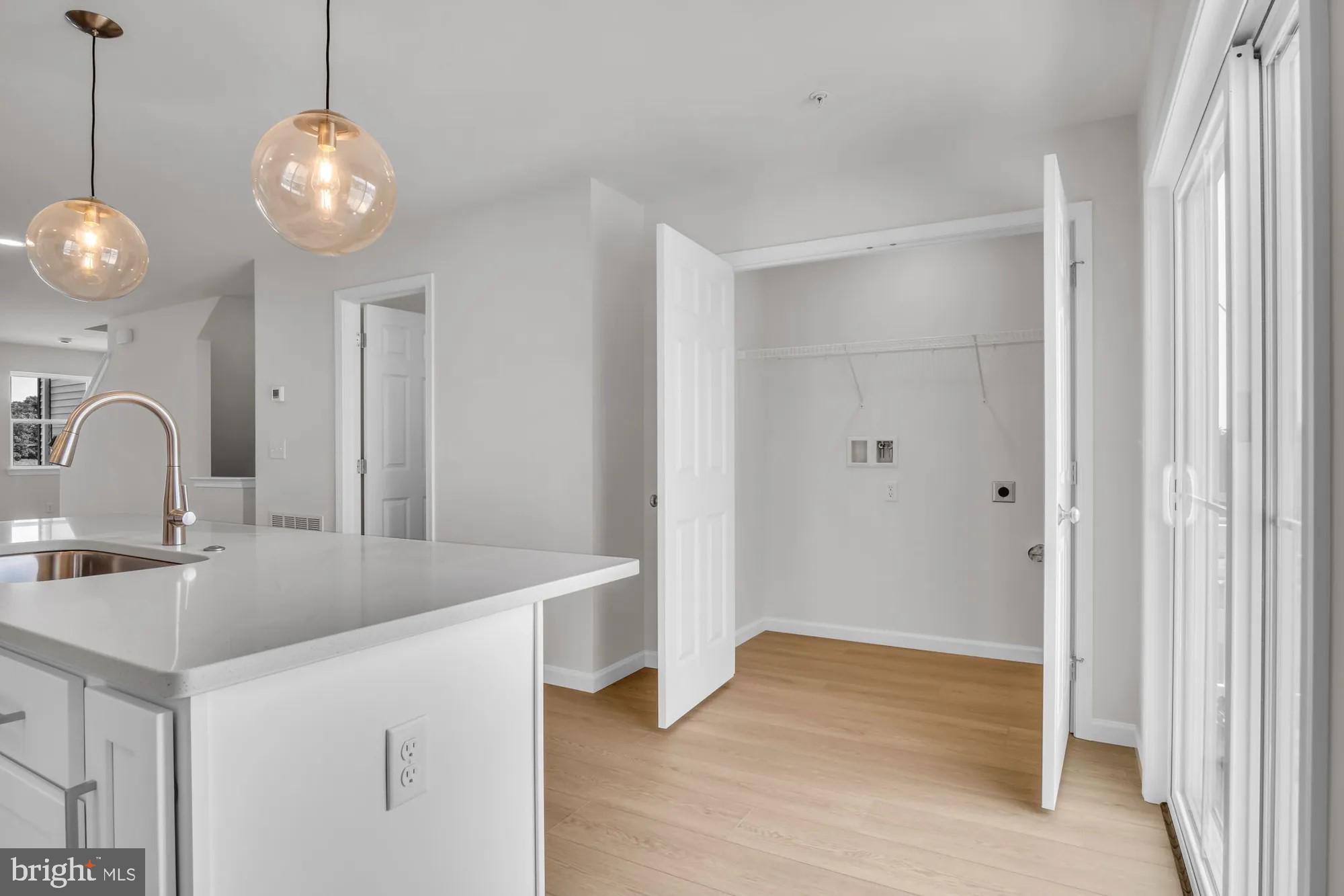4 Morgan Circle, Unit 1303 Carlisle, PA 17013 - Photo 4 of 13 a view of a sink and chandelier in a room