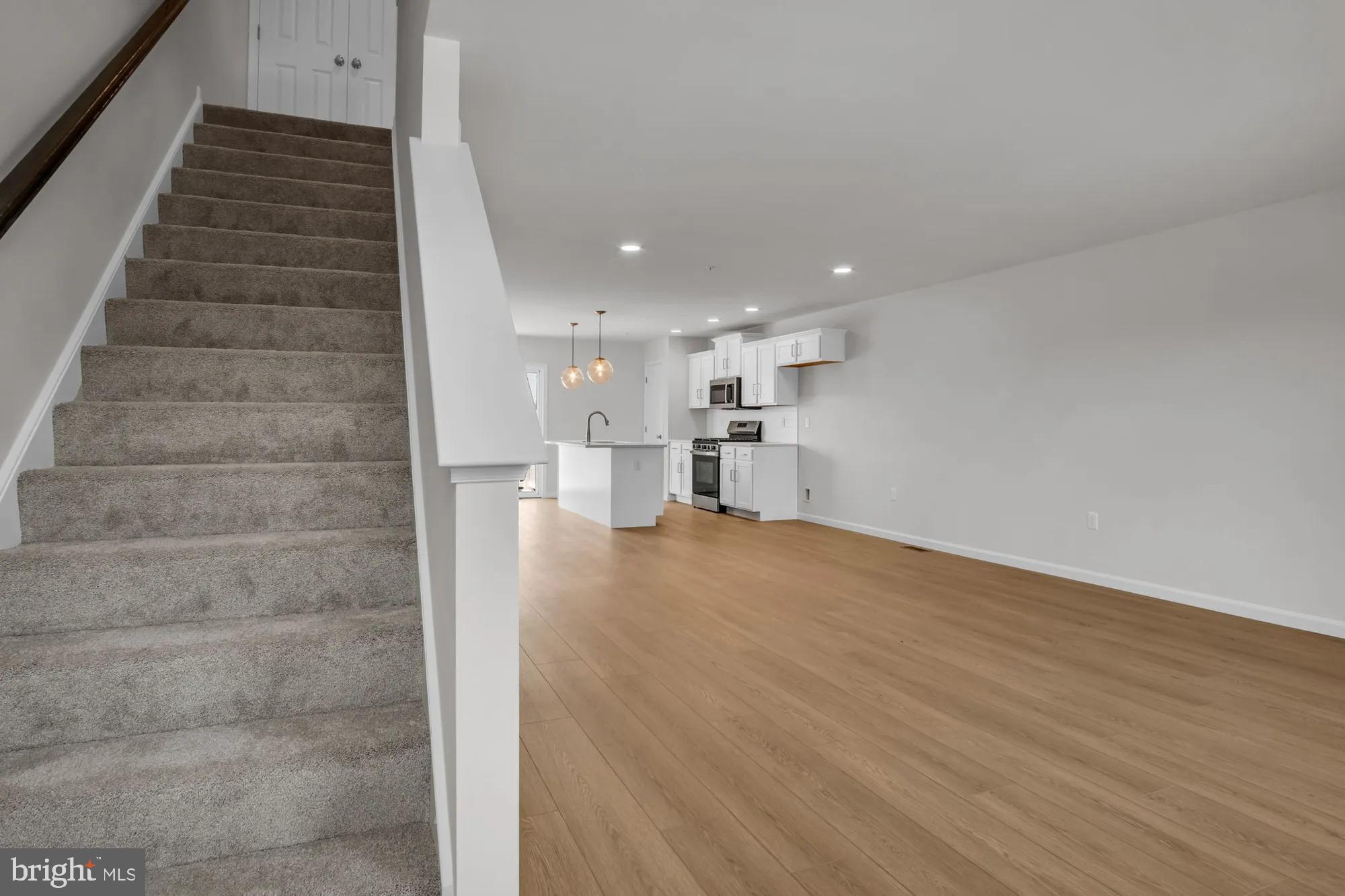 4 Morgan Circle, Unit 1303 Carlisle, PA 17013 - Photo 8 of 13 a view of wooden floor and windows in a room