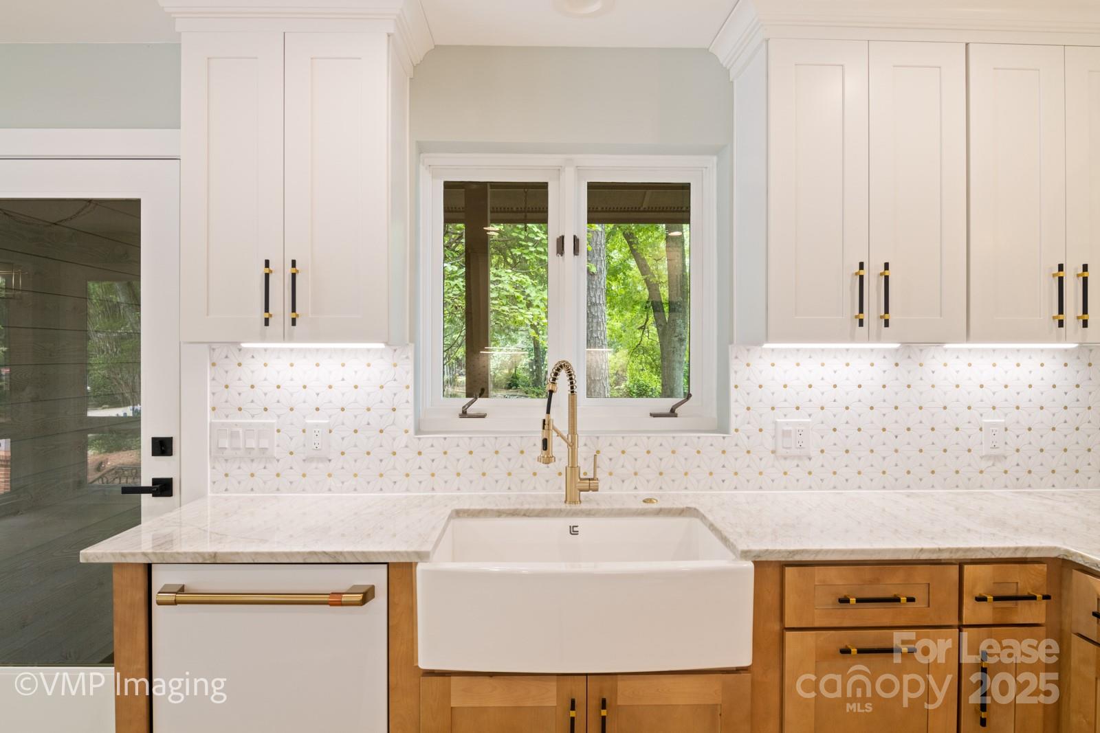 449 Windward Drive Davidson, NC 28036 - Photo 14 of 46 a bathroom with a sink and a mirror