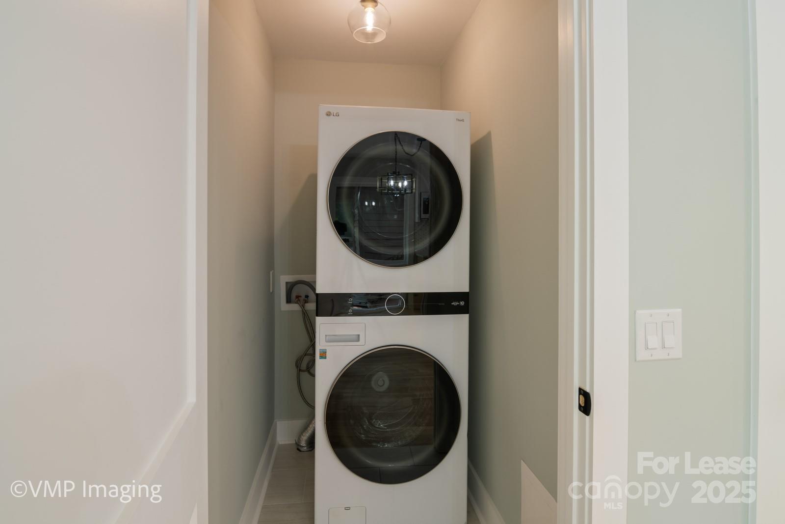 449 Windward Drive Davidson, NC 28036 - Photo 17 of 46 a utility room with dryer and washer