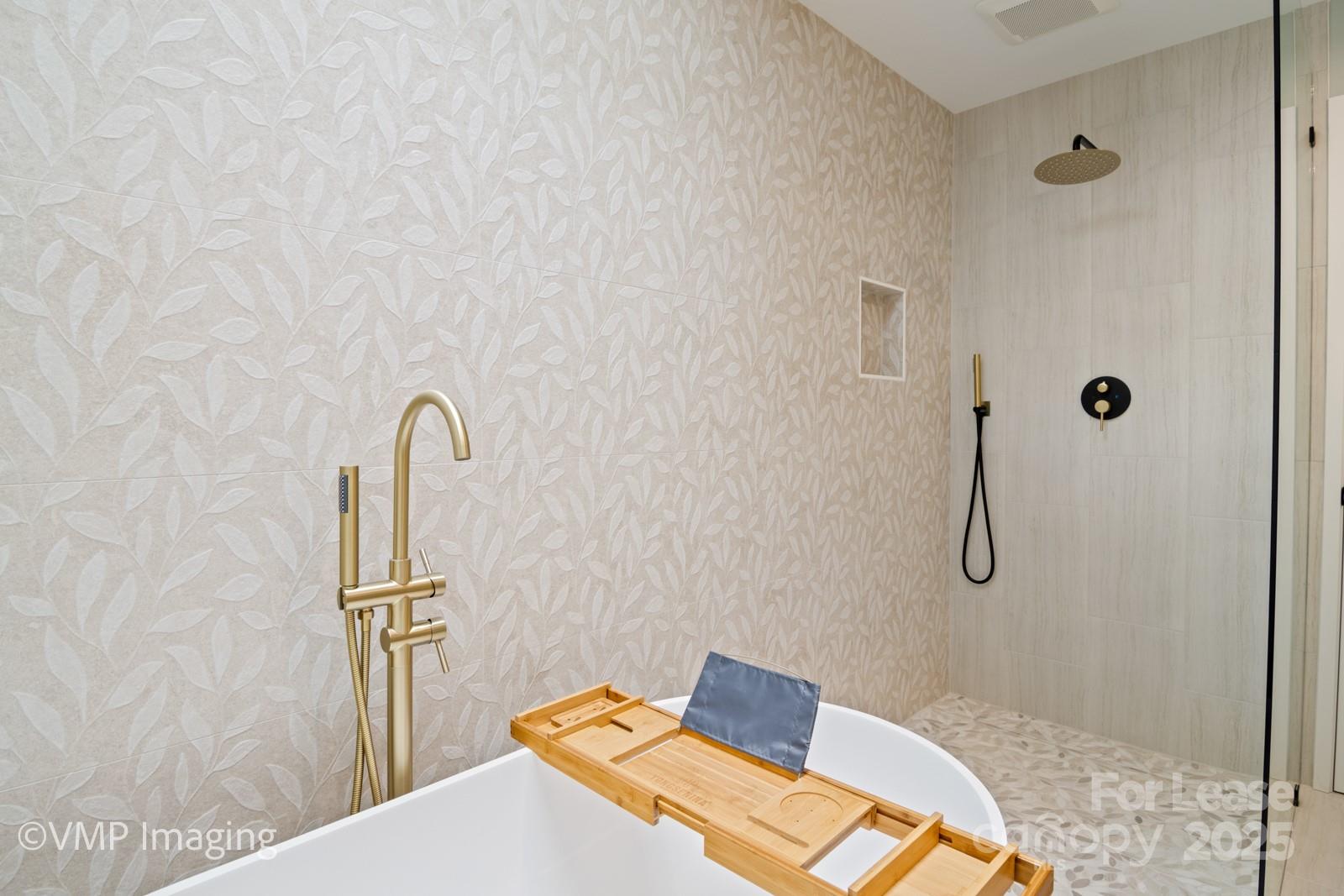 449 Windward Drive Davidson, NC 28036 - Photo 28 of 46 a bedroom with a bed and a shower