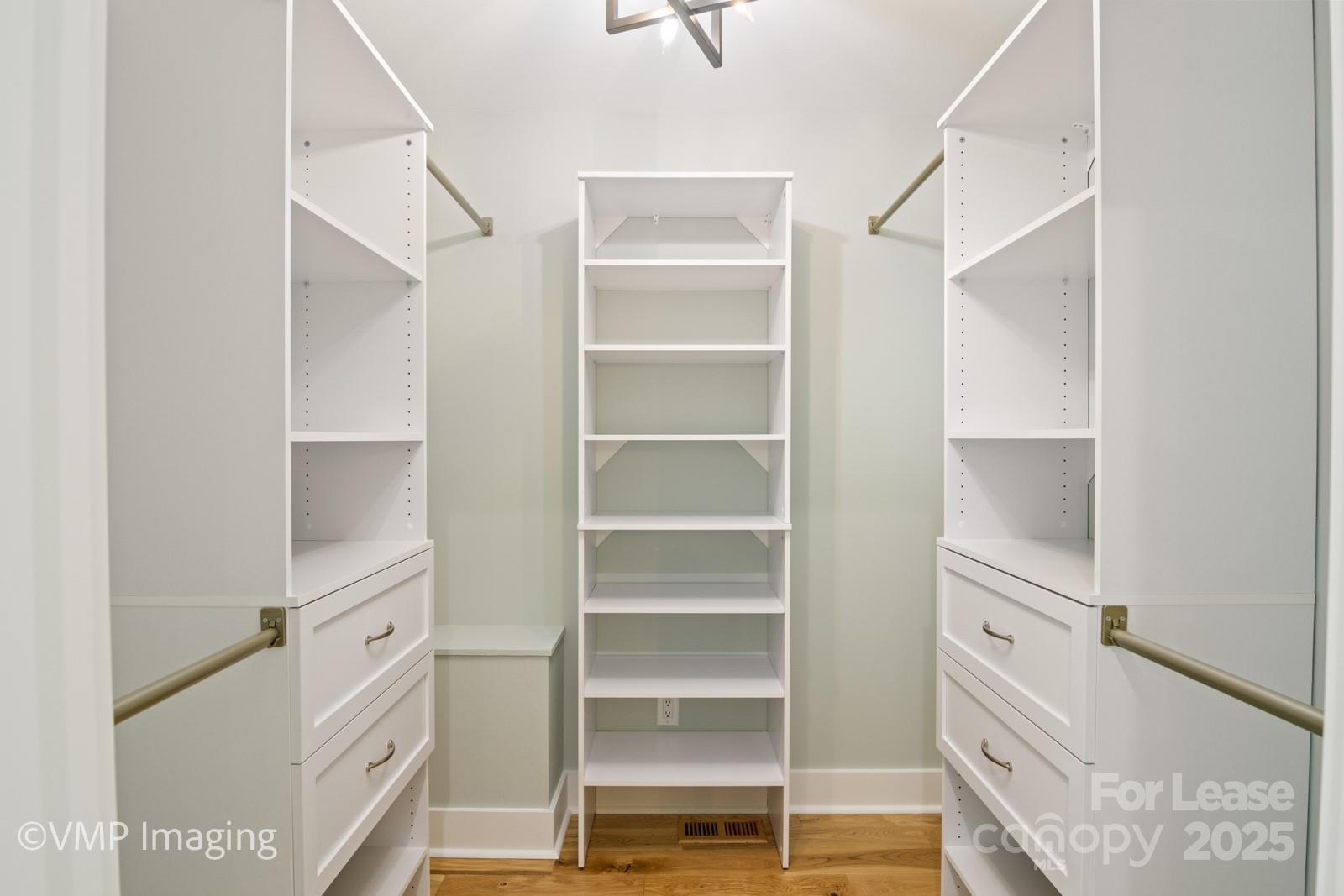 449 Windward Drive Davidson, NC 28036 - Photo 29 of 46 a bathroom with a double vanity sink and a mirror