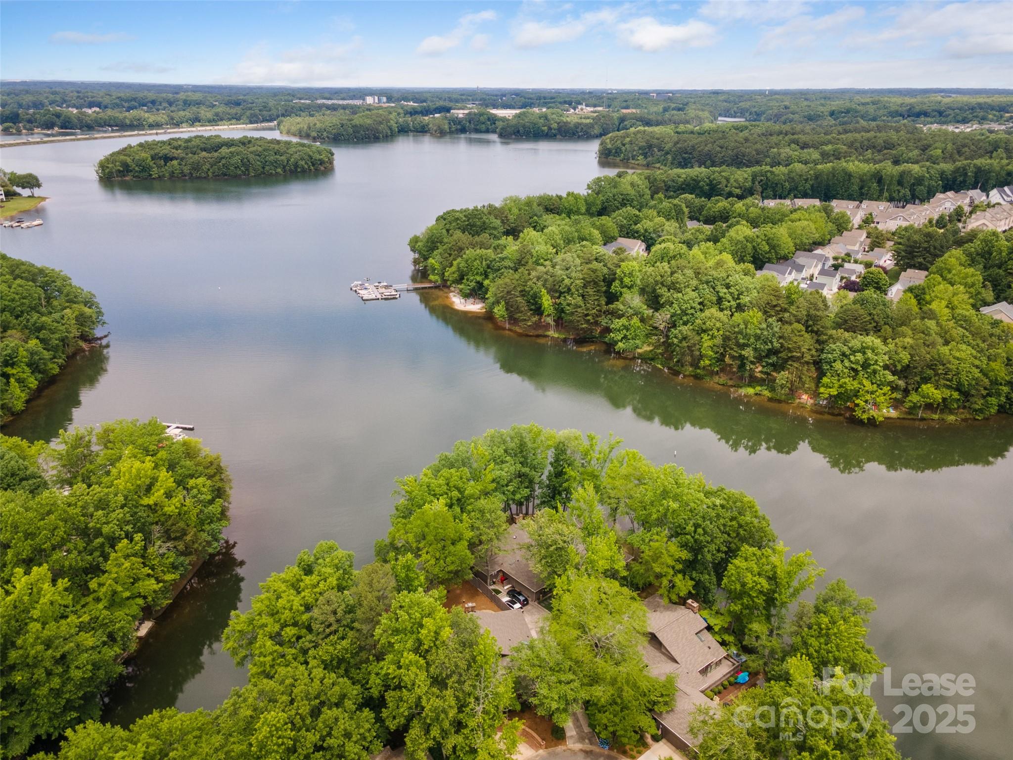449 Windward Drive Davidson, NC 28036 - Photo 33 of 46 an aerial view of valley and lake