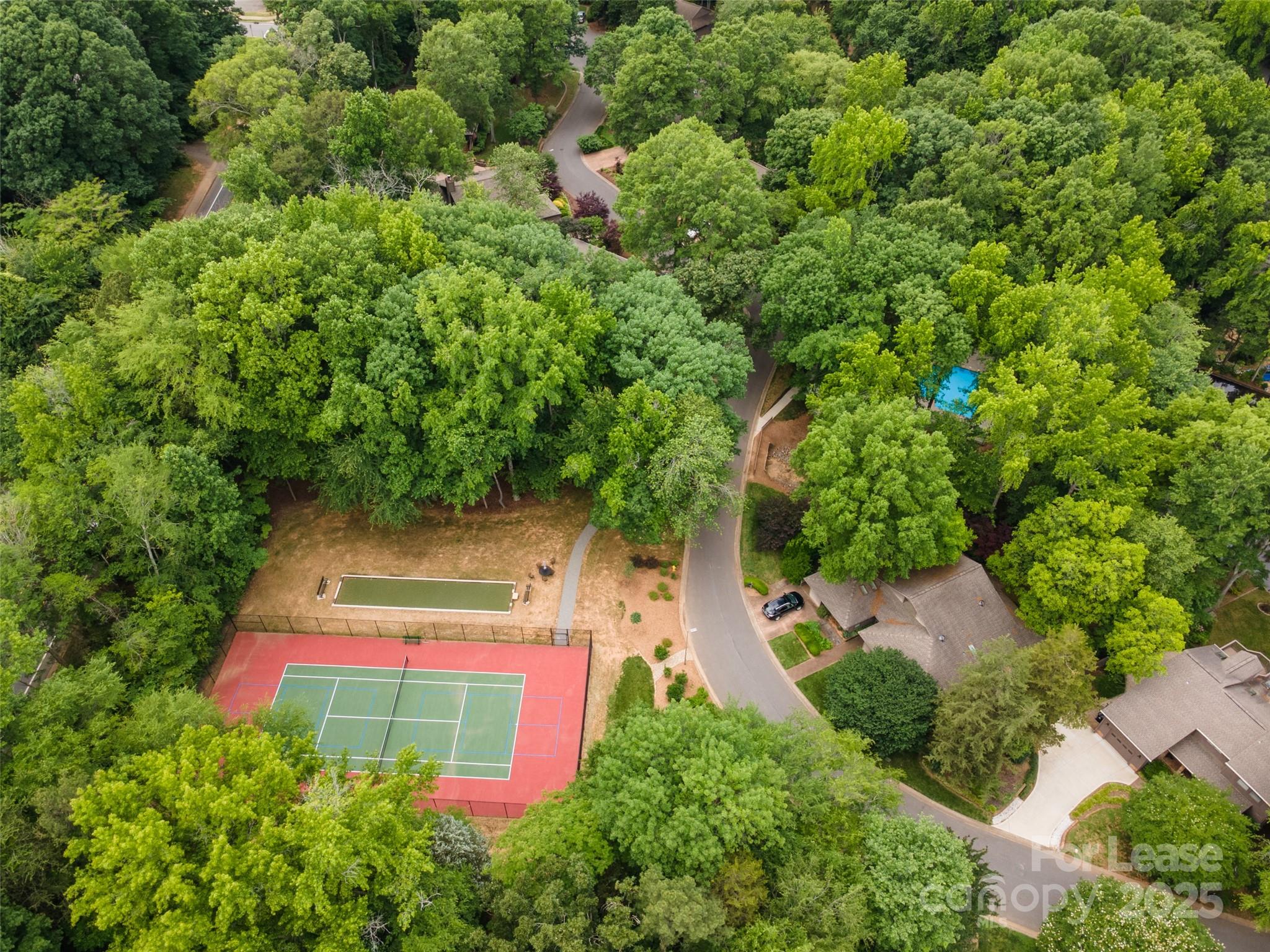 449 Windward Drive Davidson, NC 28036 - Photo 46 of 46 an aerial view of house with yard and swimming pool