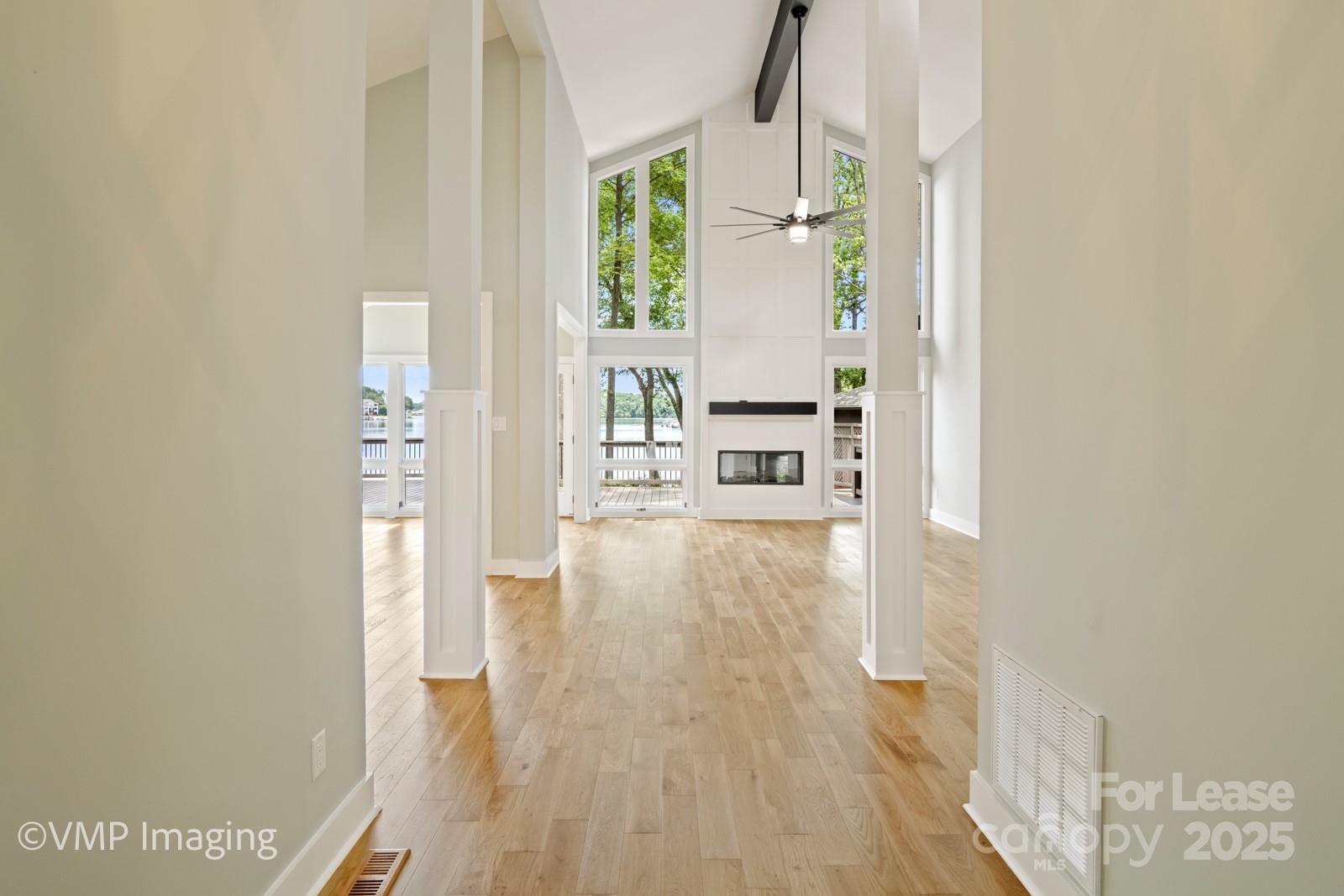 449 Windward Drive Davidson, NC 28036 - Photo 5 of 46 a view of an entryway with wooden floor