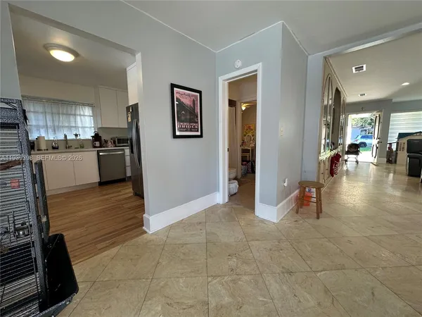 a kitchen with a sink stove and microwave