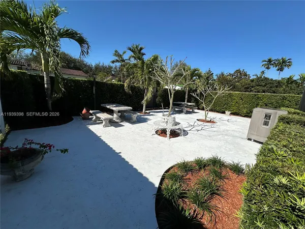 a view of swimming pool with a patio