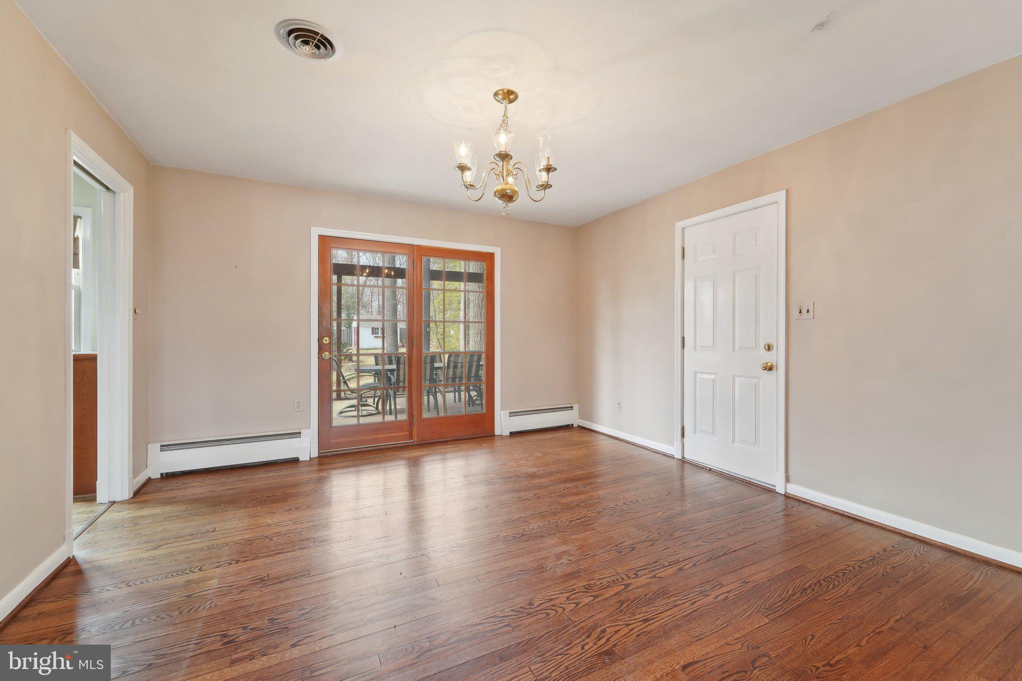 100 Stauffer Road Severna Park, MD 21146 - Photo 4 of 53 Dining Room has Atrium Door to a Screened Porch