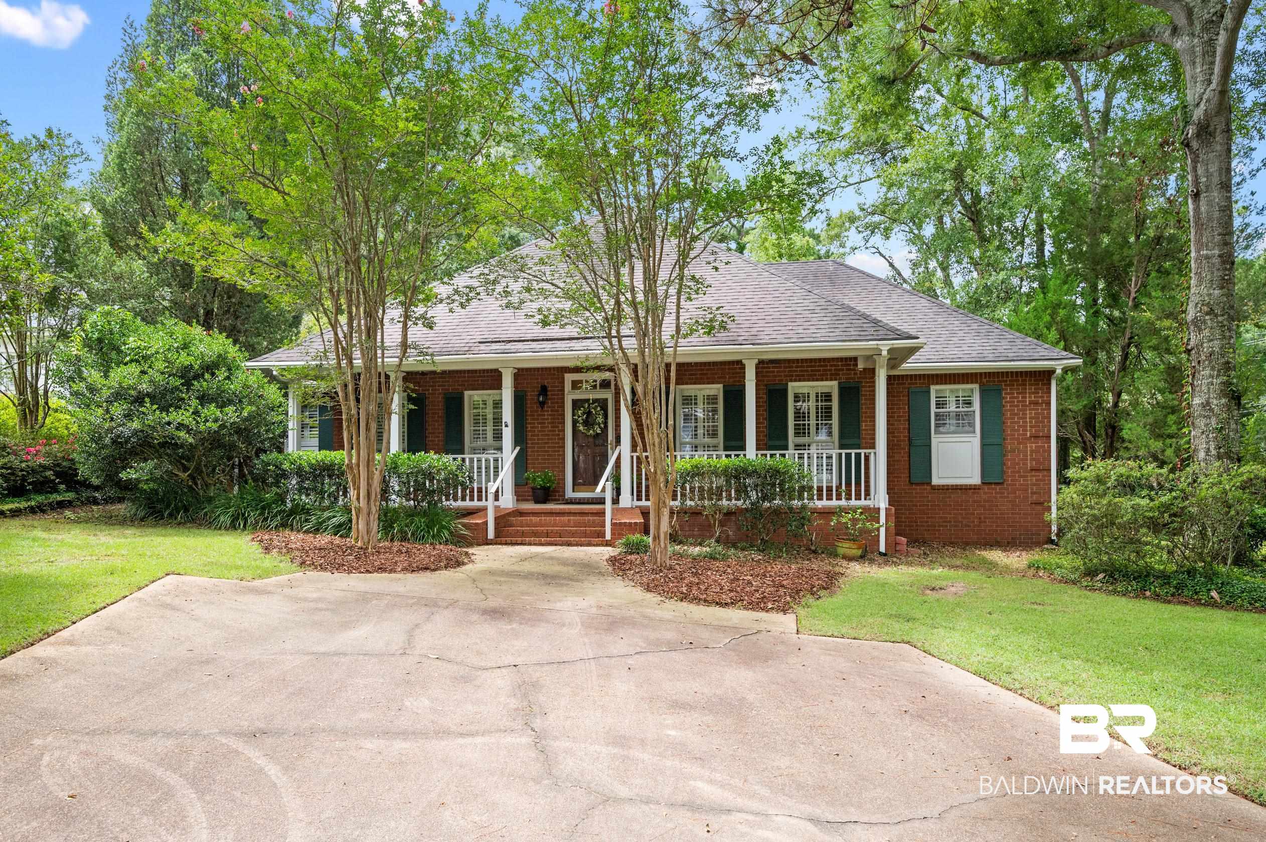 6638 Jackson Square Daphne, AL 36526 - Photo 37 of 62 Ranch-style house featuring a front lawn and covered porch