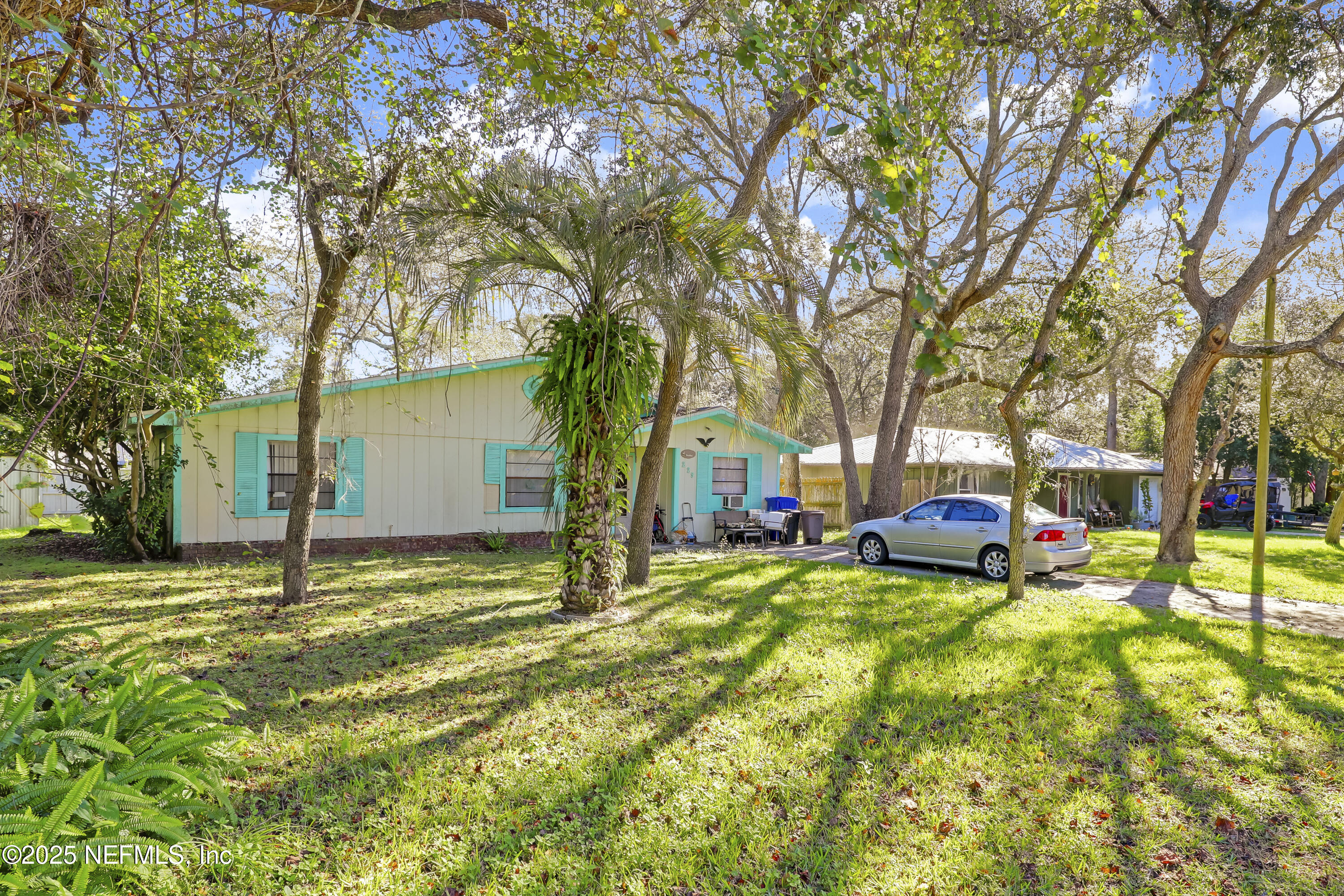 229 Bonita Road St. Augustine, FL 32086 - Photo 2 of 9 a house view with a sitting space