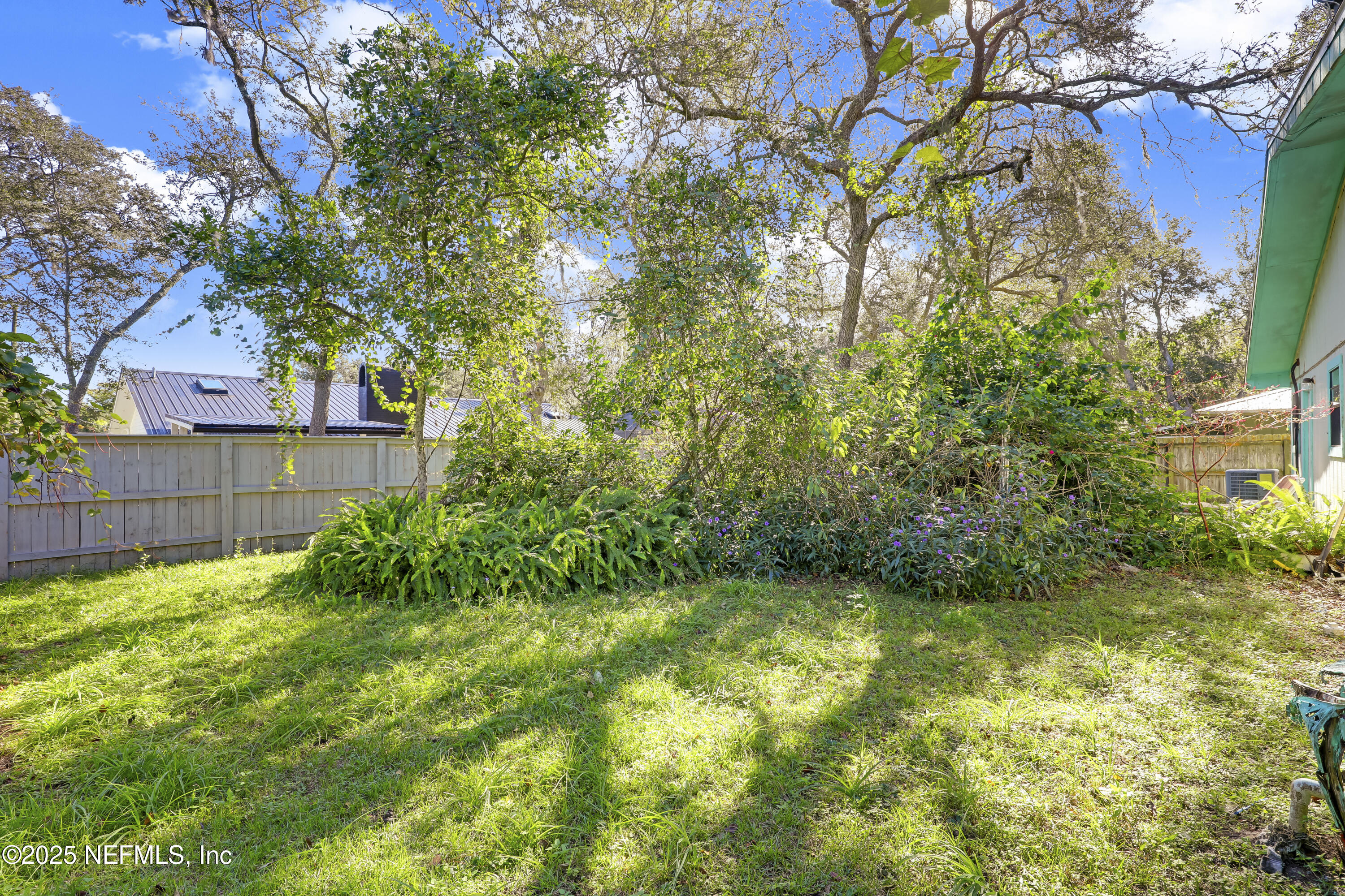 229 Bonita Road St. Augustine, FL 32086 - Photo 4 of 9 a view of a yard with large trees