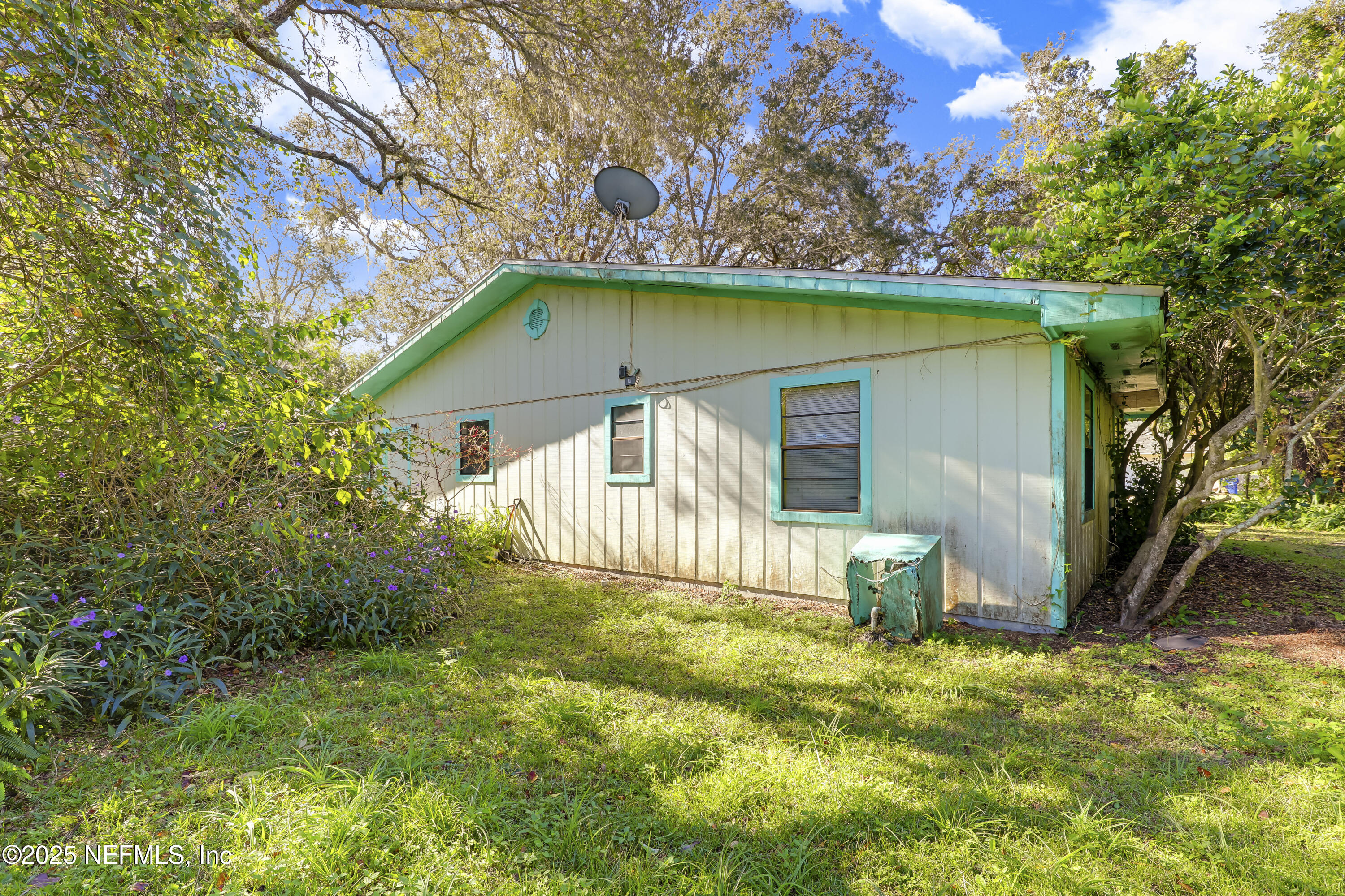 229 Bonita Road St. Augustine, FL 32086 - Photo 6 of 9 a view of a house with a yard