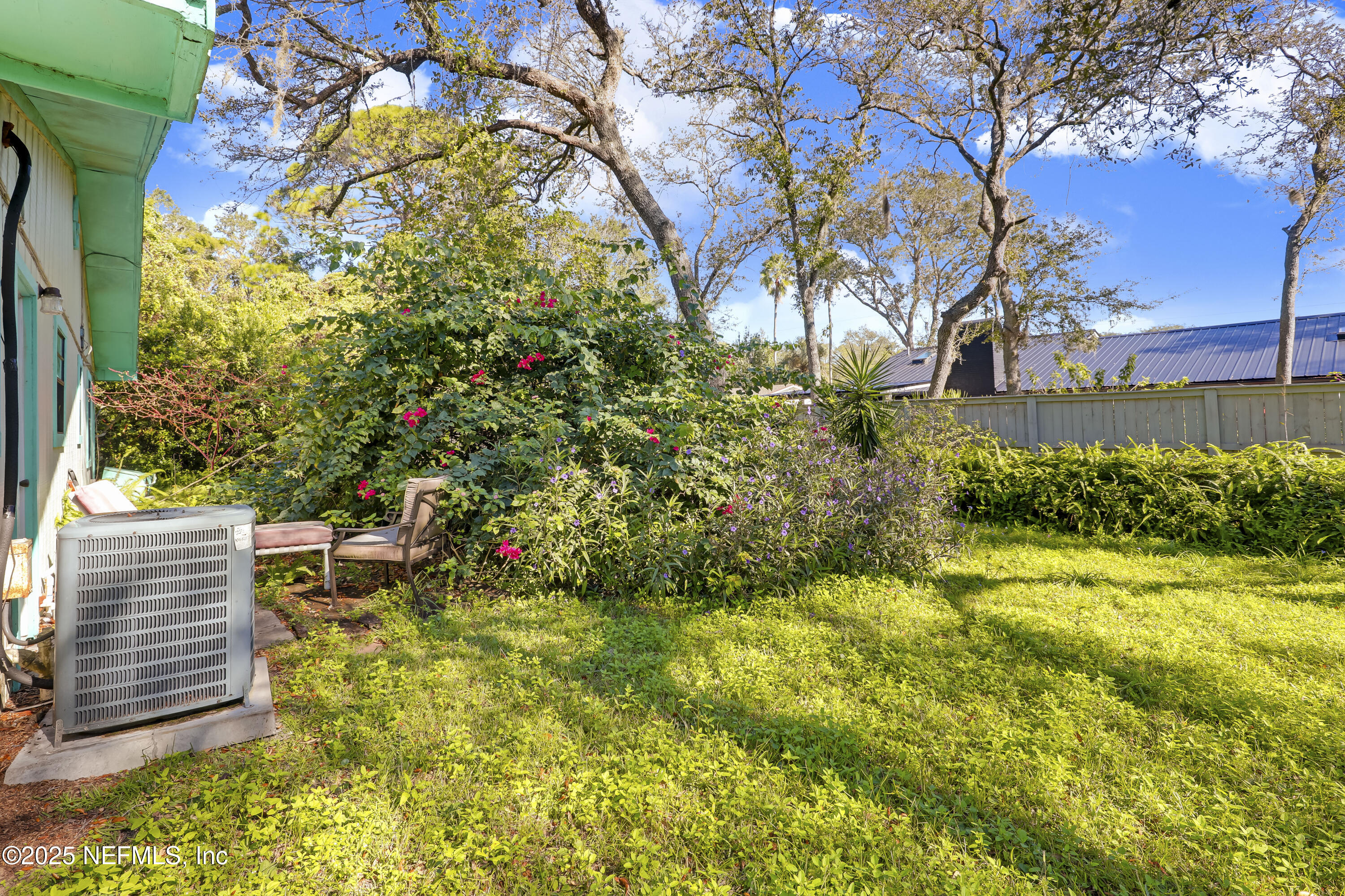229 Bonita Road St. Augustine, FL 32086 - Photo 7 of 9 a backyard of a house with lots of green space