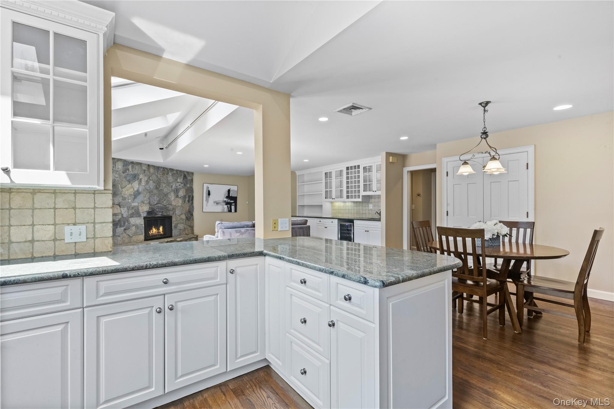 175 Finch Road North Salem, NY 10560 - Photo 12 of 44 a kitchen with granite countertop white cabinets and stainless steel appliances
