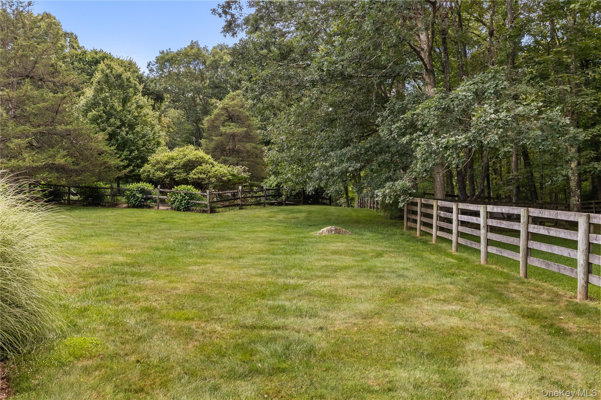 175 Finch Road North Salem, NY 10560 - Photo 40 of 44 a view of a swimming pool with an outdoor space and seating area
