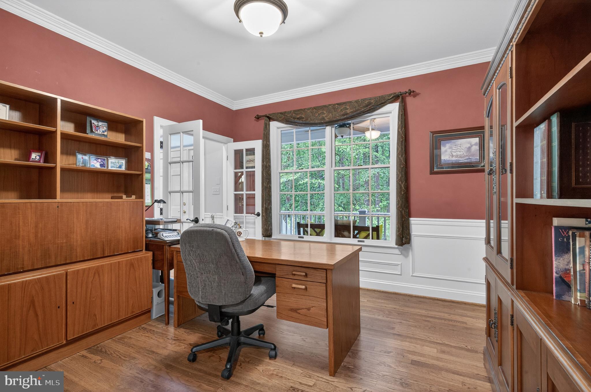 6601 Colchester Road Fairfax Station, VA 22039 - Photo 29 of 78 a view of a workspace with furniture and a window