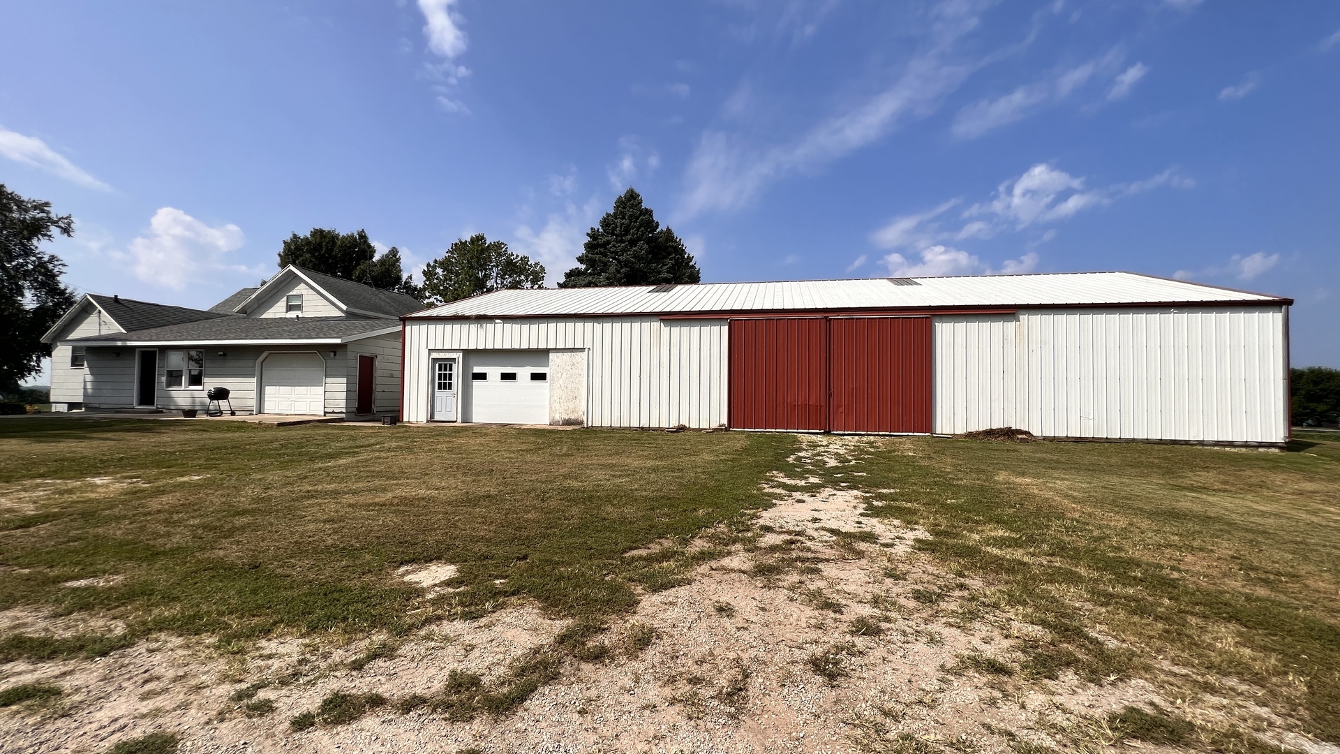 23160 Carroll Road Morrison, IL 61270 - Photo 2 of 44 a front view of a house with a yard