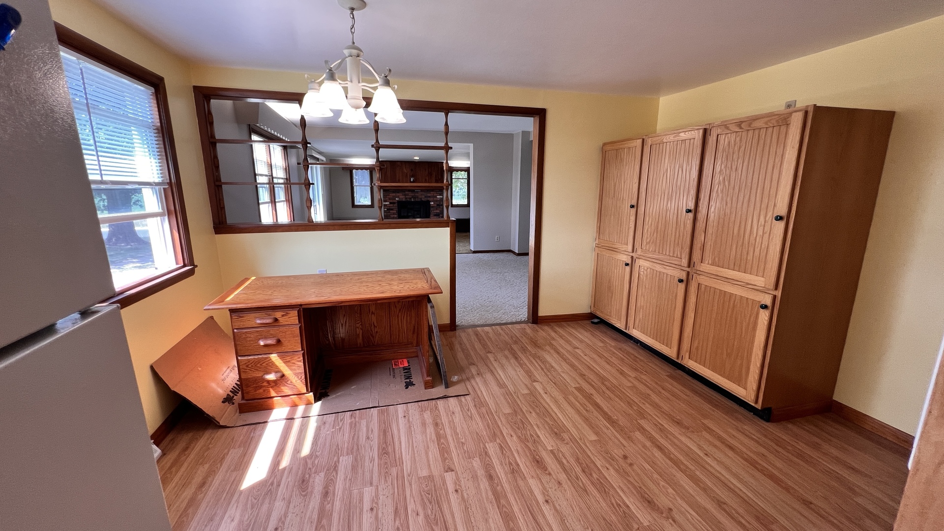 23160 Carroll Road Morrison, IL 61270 - Photo 29 of 44 a view of a livingroom with wooden floor and kitchen view