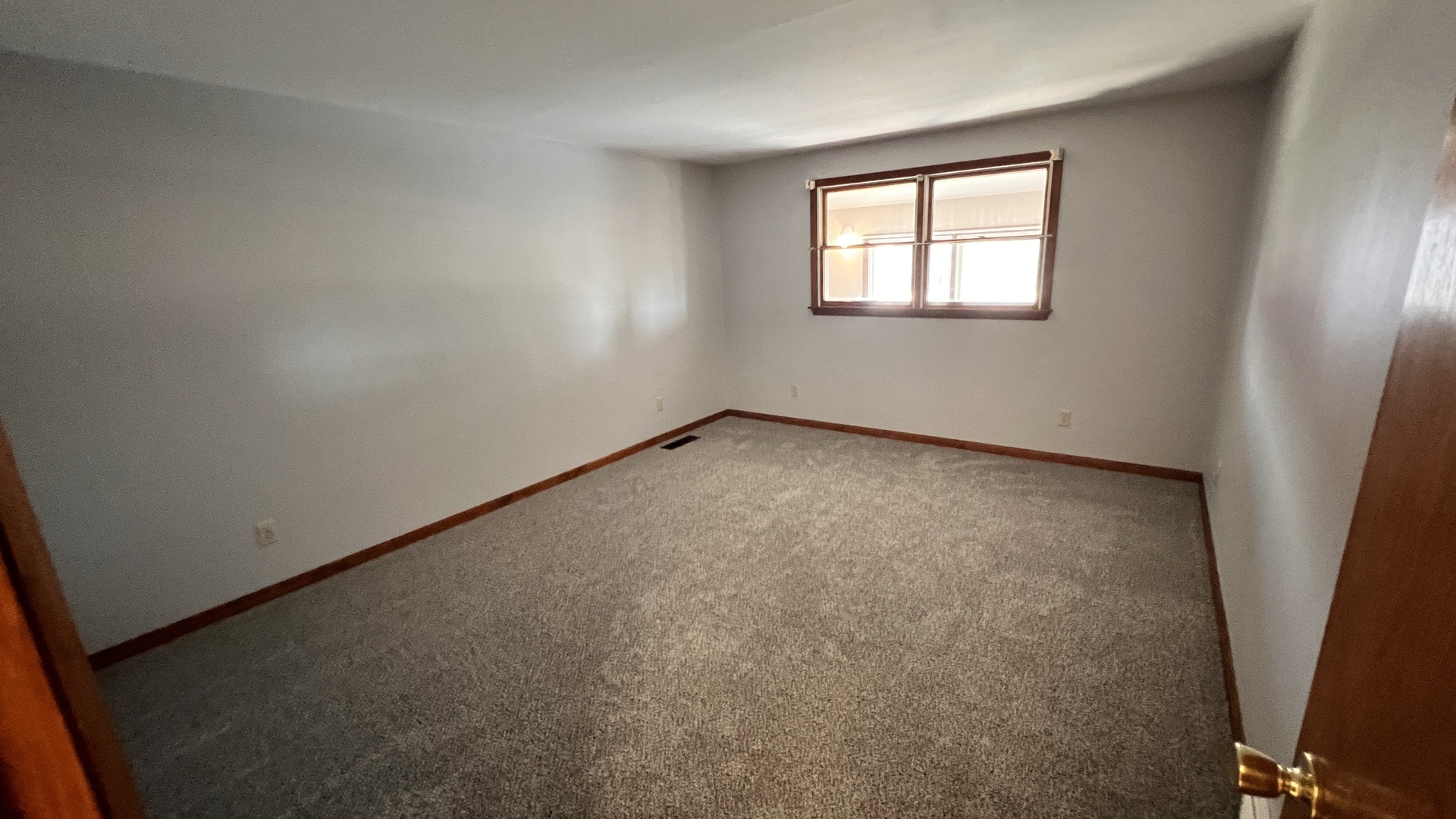 23160 Carroll Road Morrison, IL 61270 - Photo 34 of 44 an empty room with a window