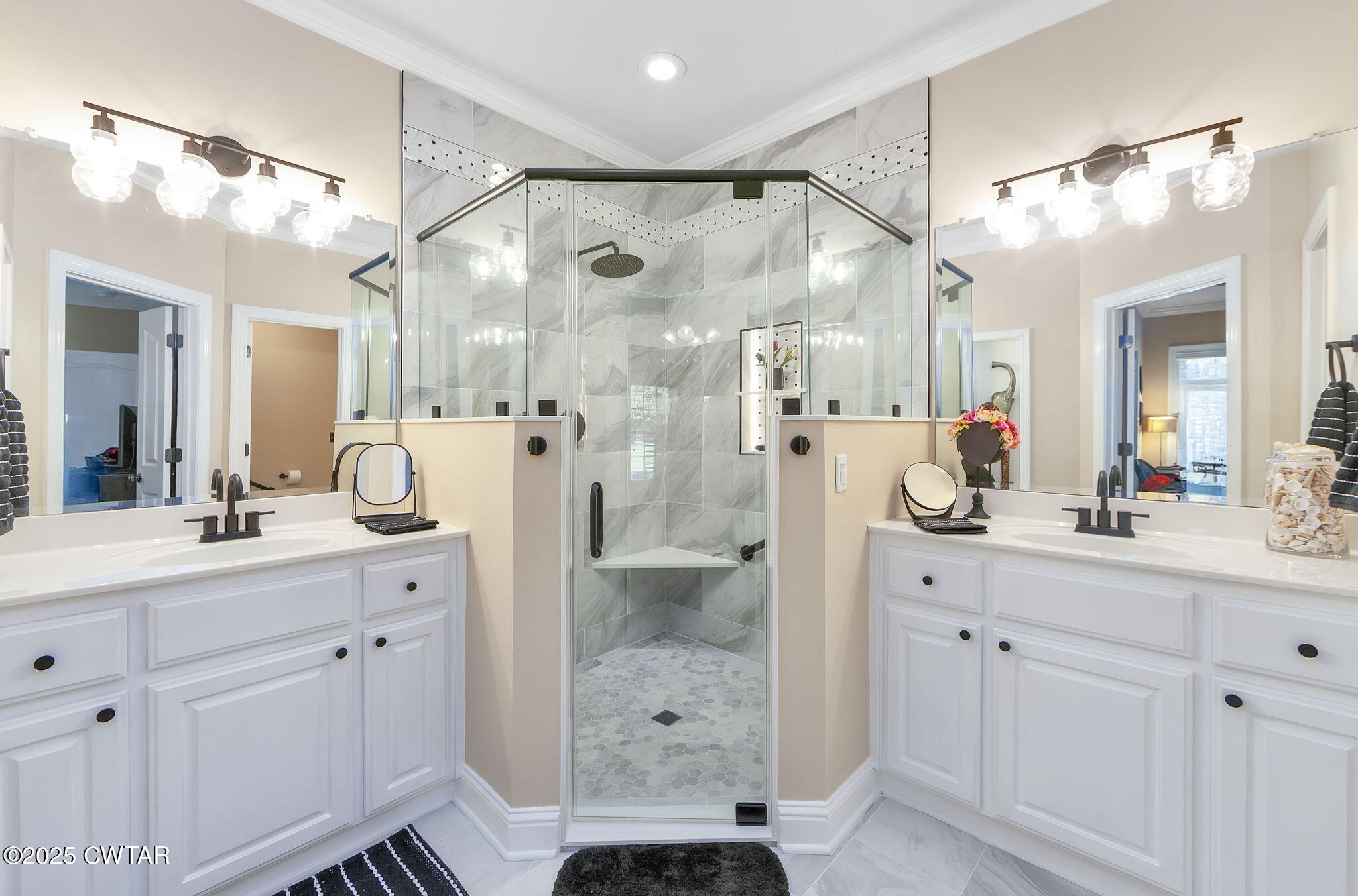 188 Quail Ridge Jackson, TN 38305 - Photo 13 of 29 a bathroom with a double vanity sink mirror and shower