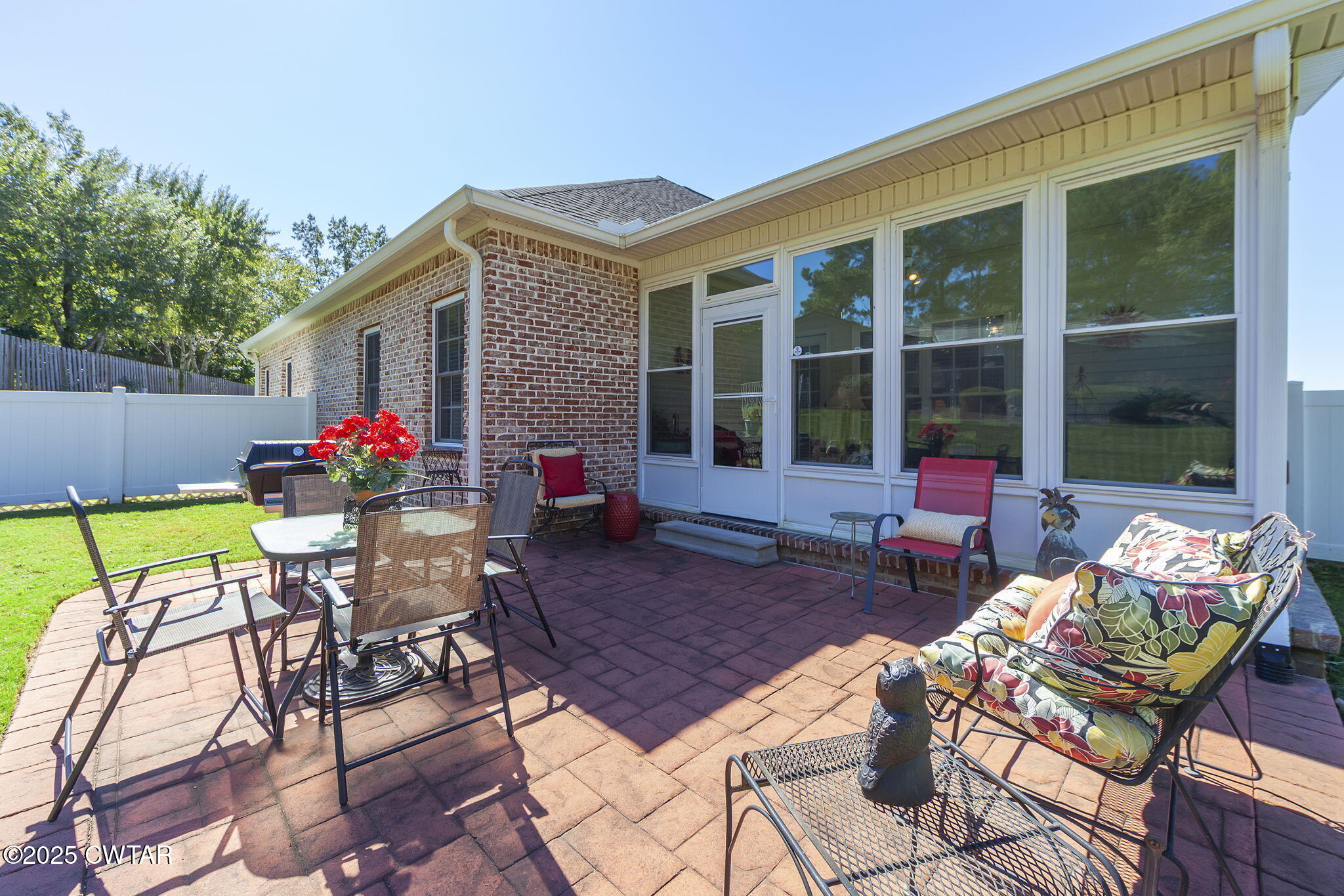 188 Quail Ridge Jackson, TN 38305 - Photo 22 of 29 a view of a house with backyard sitting area and garden