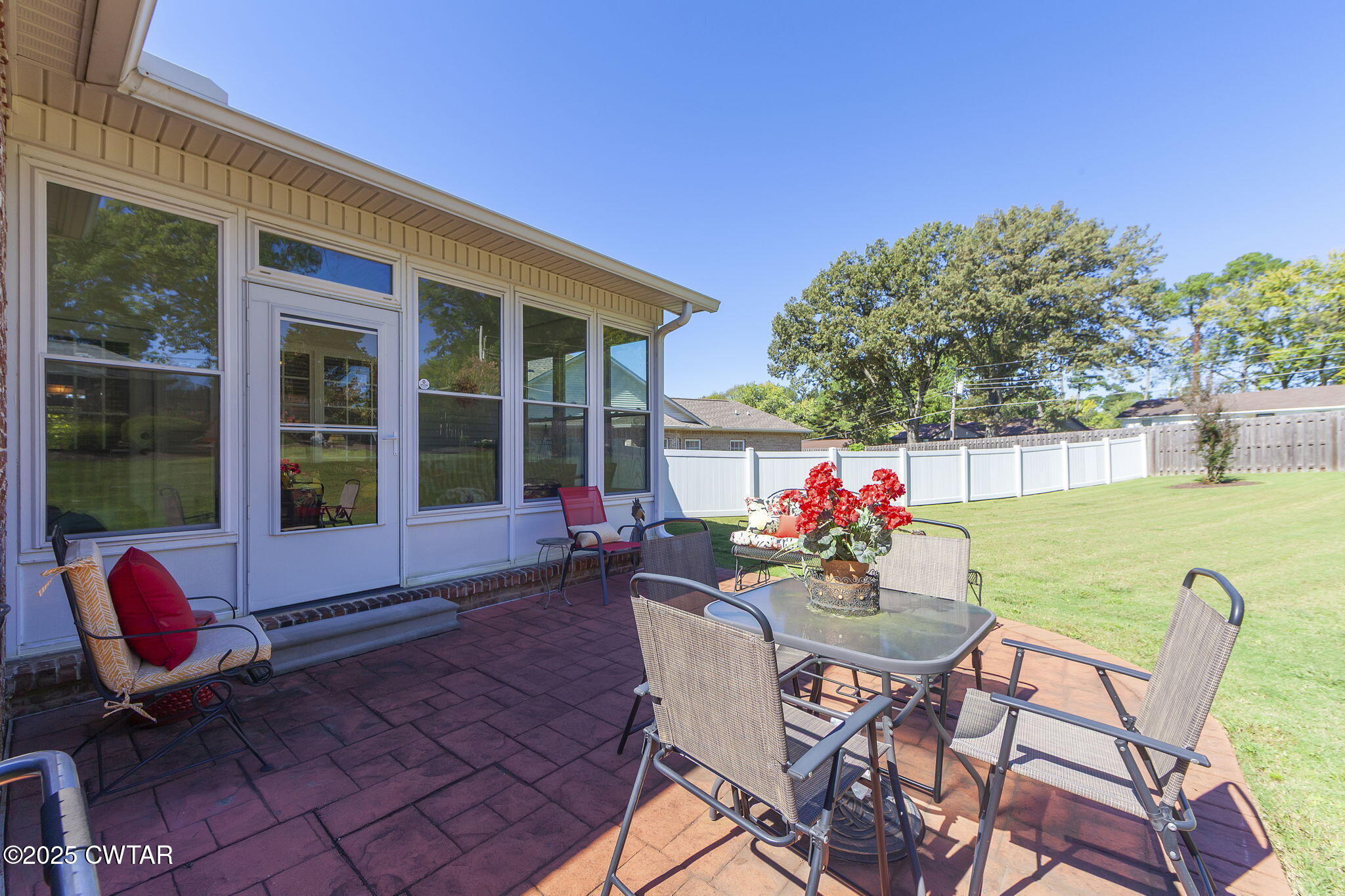 188 Quail Ridge Jackson, TN 38305 - Photo 23 of 29 a view of a chairs and table in the patio with a fire pit