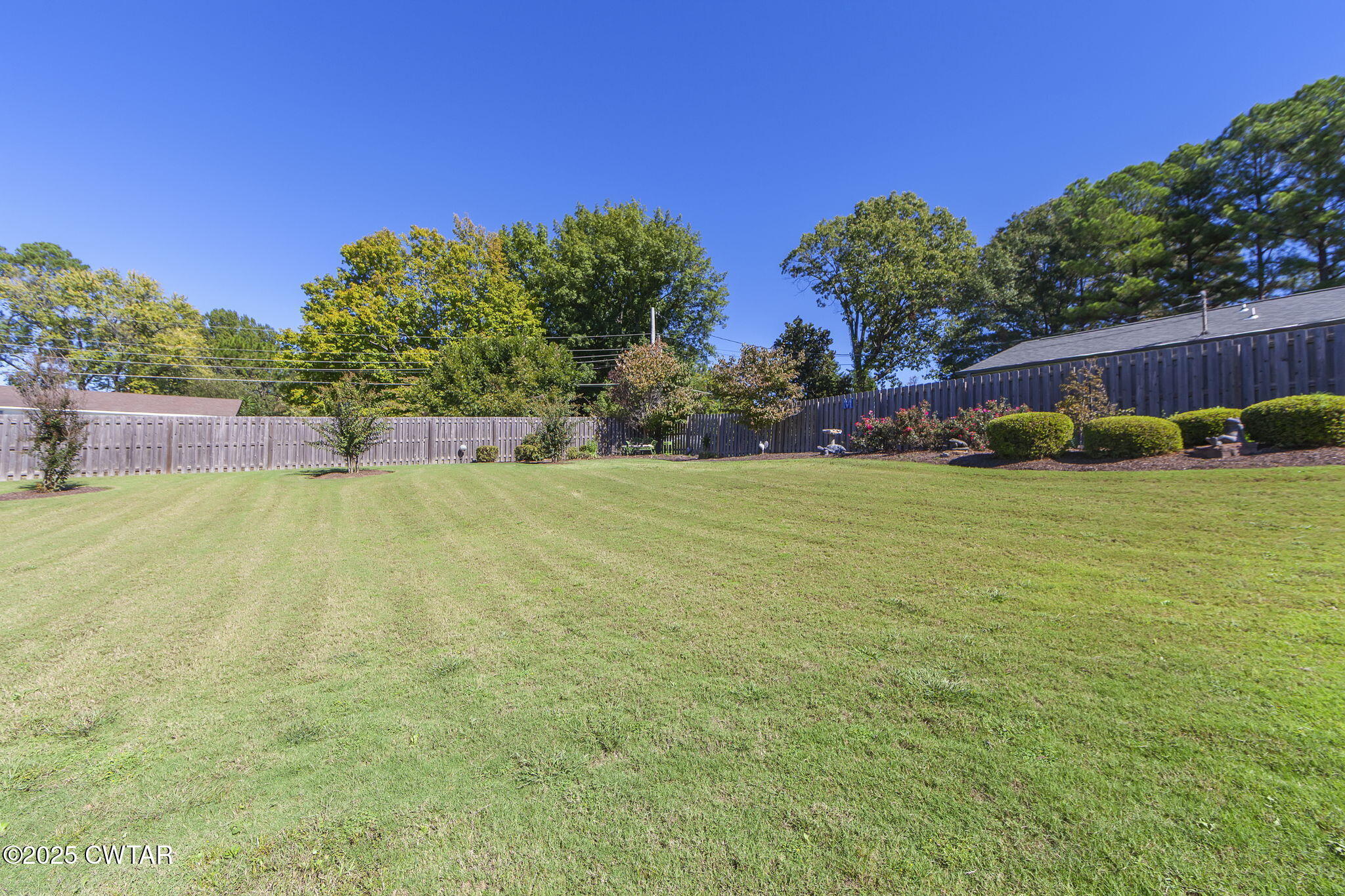 188 Quail Ridge Jackson, TN 38305 - Photo 26 of 29 a view of a field with grass and trees
