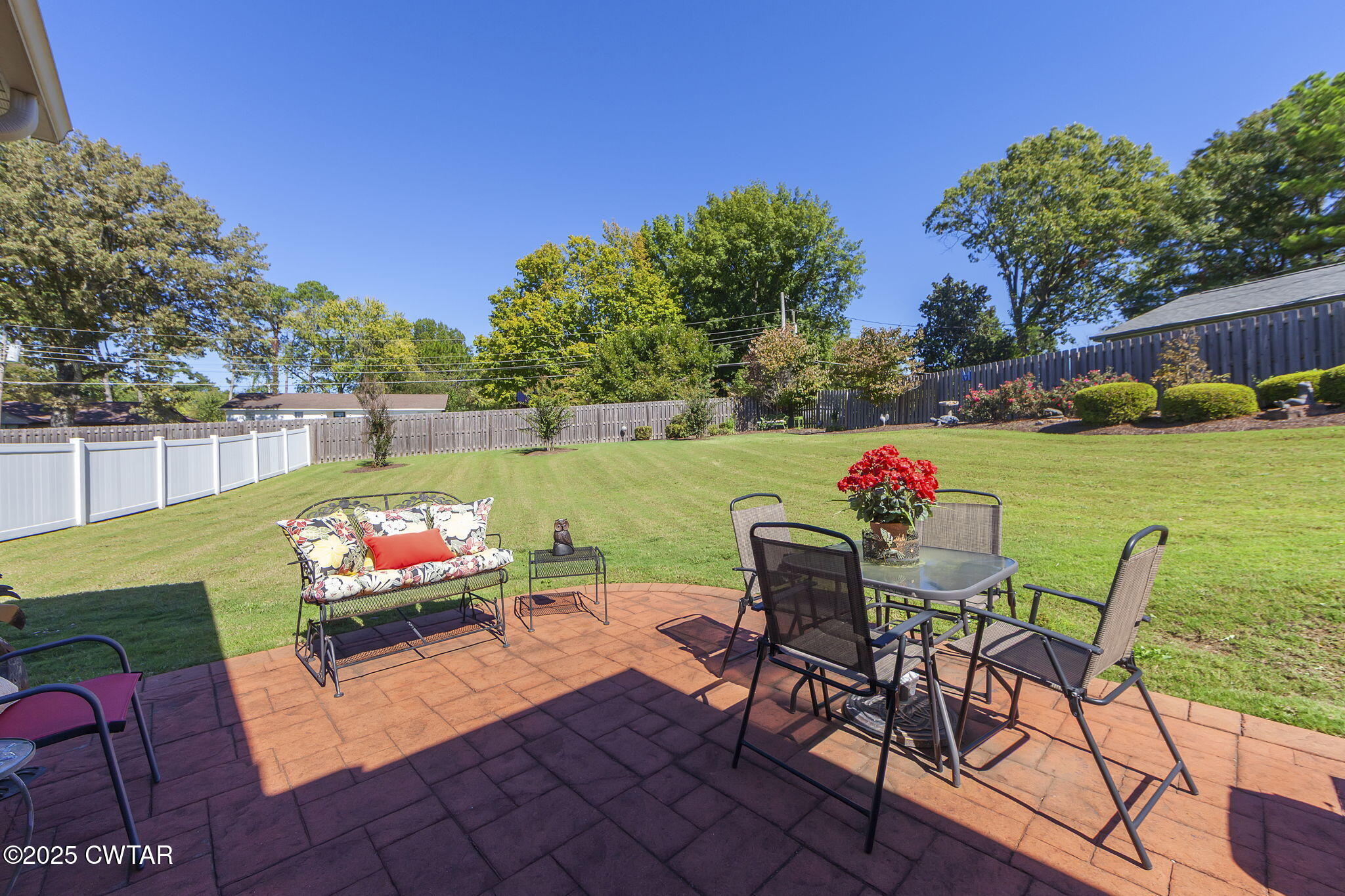 188 Quail Ridge Jackson, TN 38305 - Photo 27 of 29 a view of a chairs and table in patio with a yard
