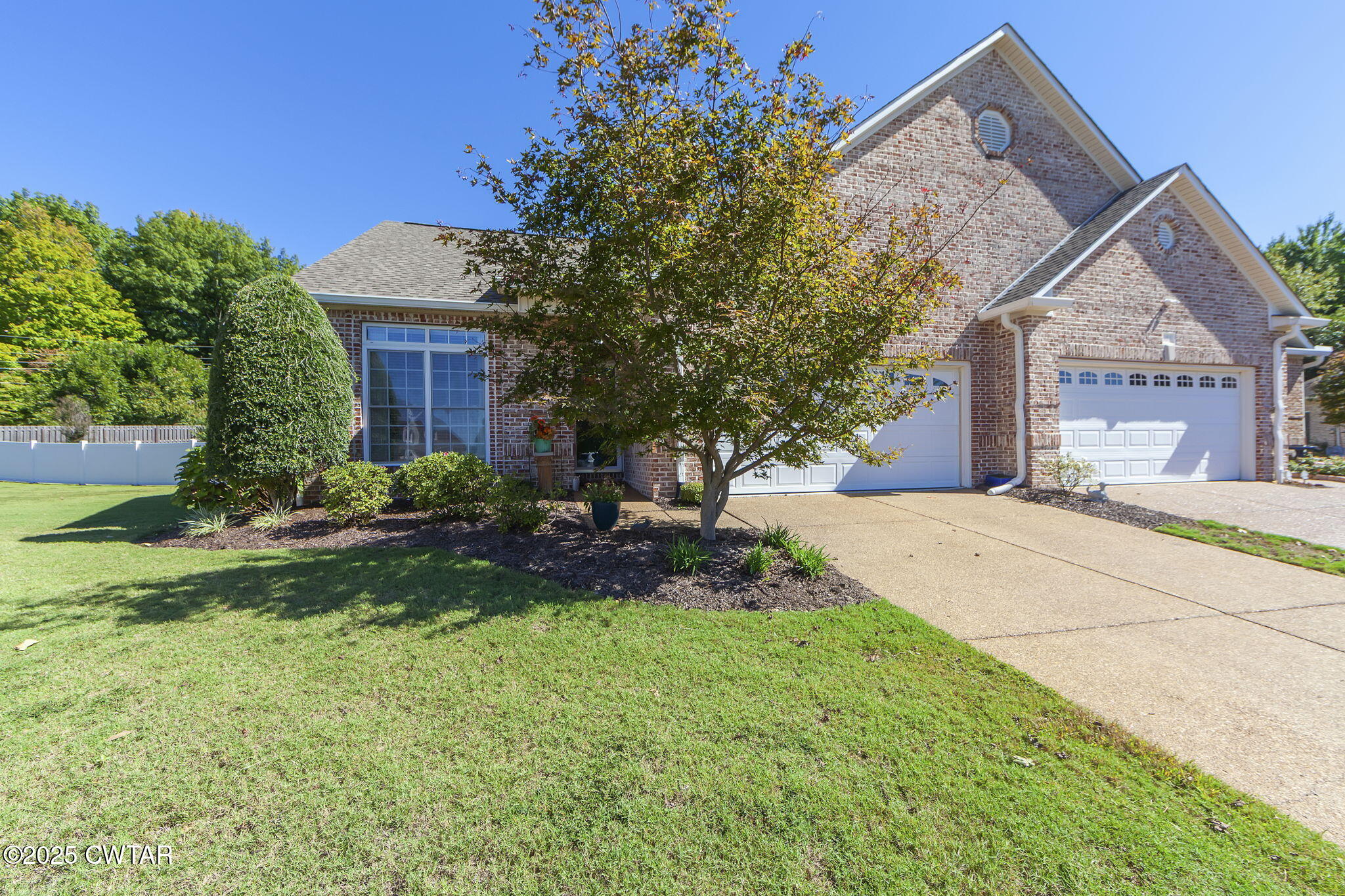 188 Quail Ridge Jackson, TN 38305 - Photo 29 of 29 a front view of a house with garden