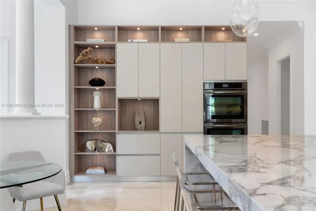 a view of hall way with furniture and entryway