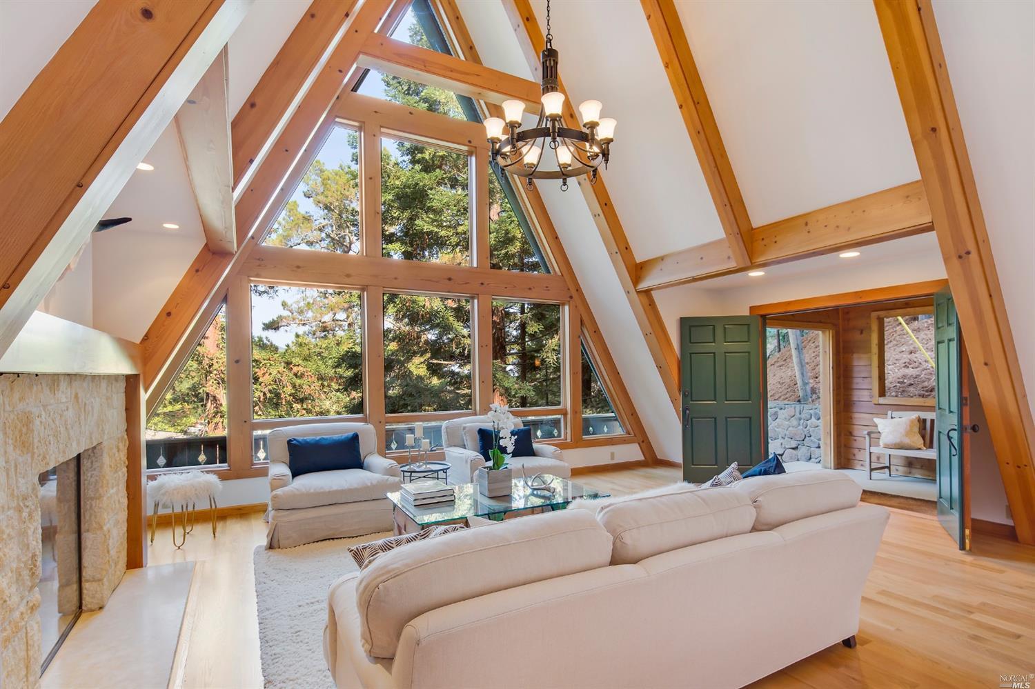 14 Sierra Circle San Rafael, CA 94901 - Photo 1 of 1 a living room with furniture and a floor to ceiling window