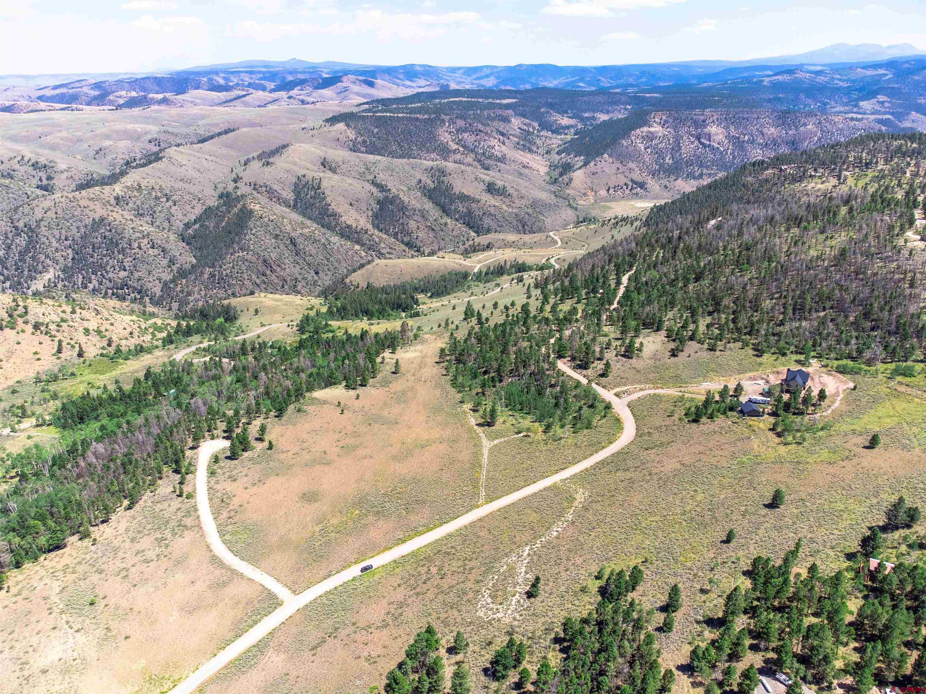 131 Mosquito Trail Powderhorn, CO 81243 - Photo 8 of 9 an aerial view of a house with a yard