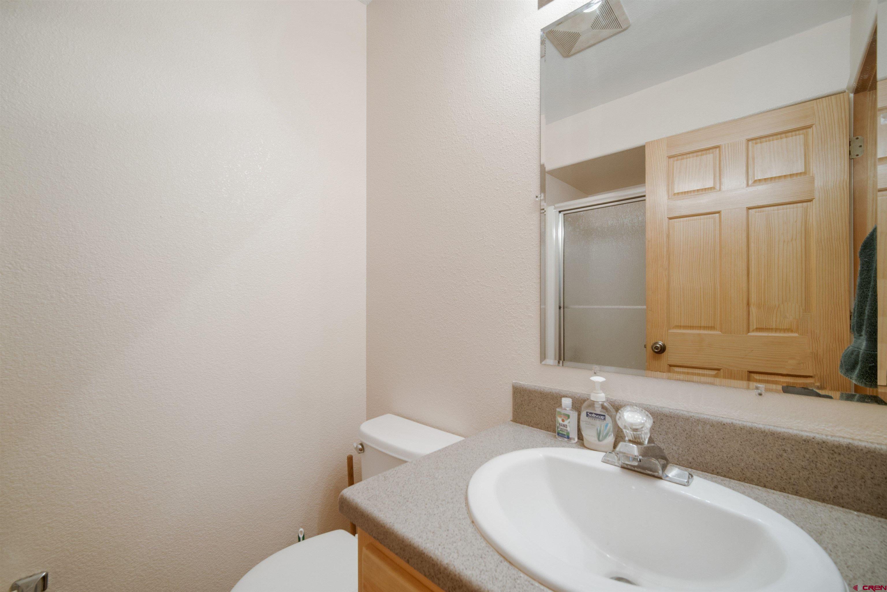 660 Road 8k Egnar, CO 81325 - Photo 13 of 30 a bathroom with a sink and a mirror