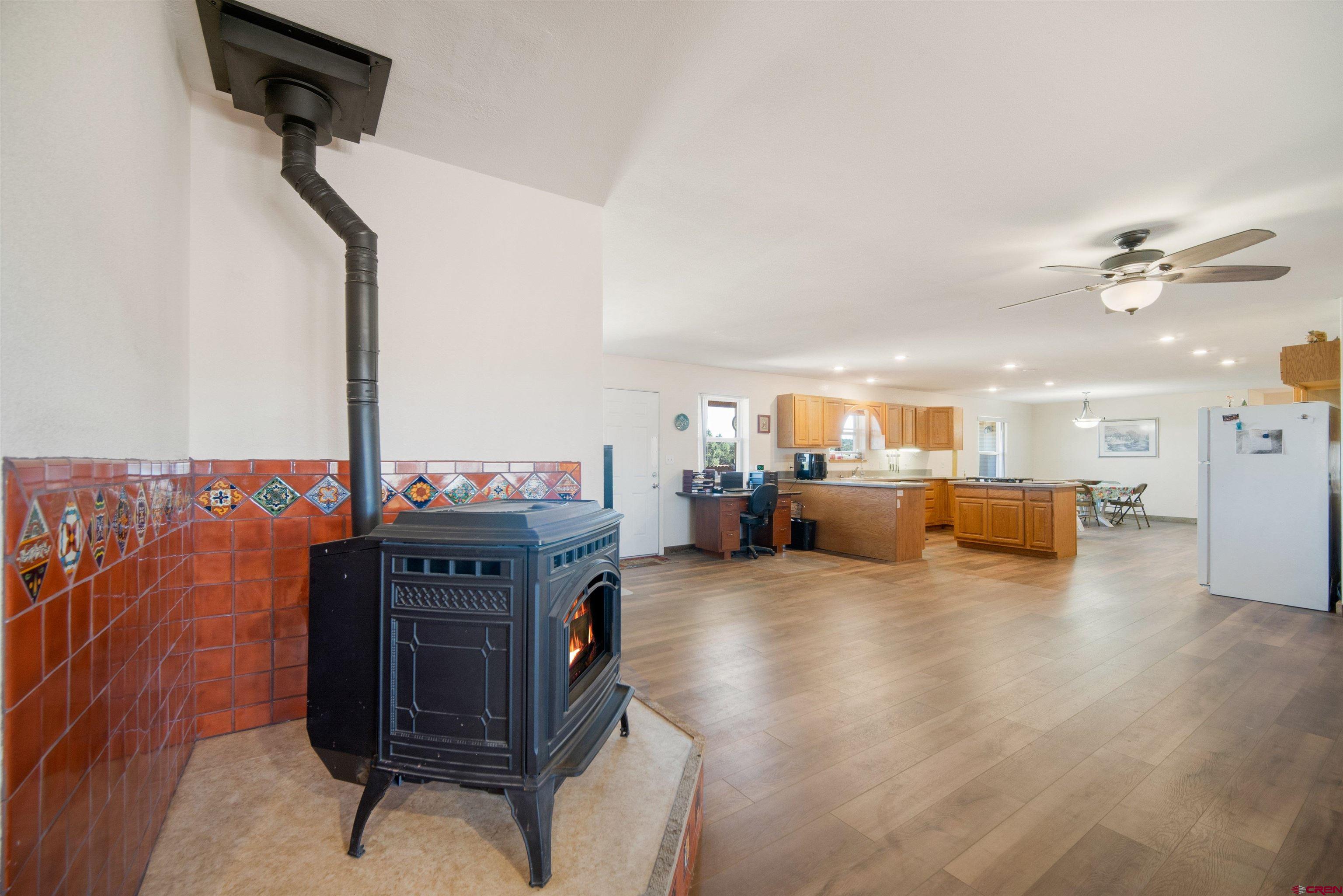 660 Road 8k Egnar, CO 81325 - Photo 18 of 30 a view of a livingroom with furniture and a ceiling fan