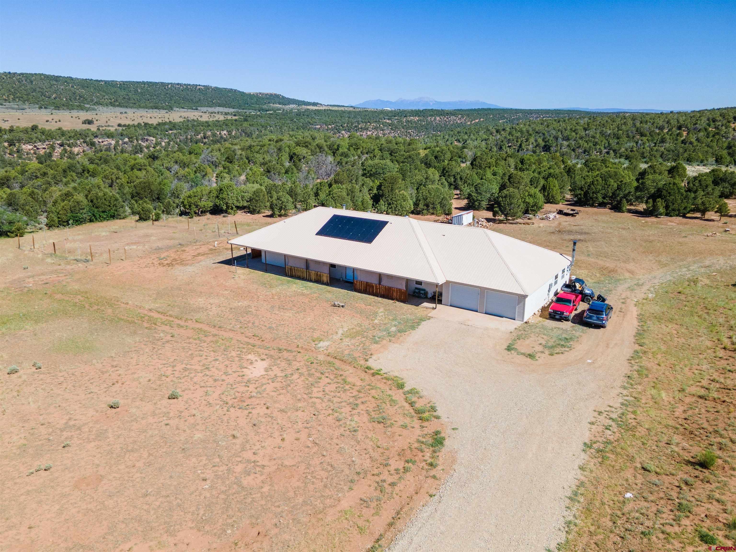 660 Road 8k Egnar, CO 81325 - Photo 22 of 30 a view of an outdoor space and a yard