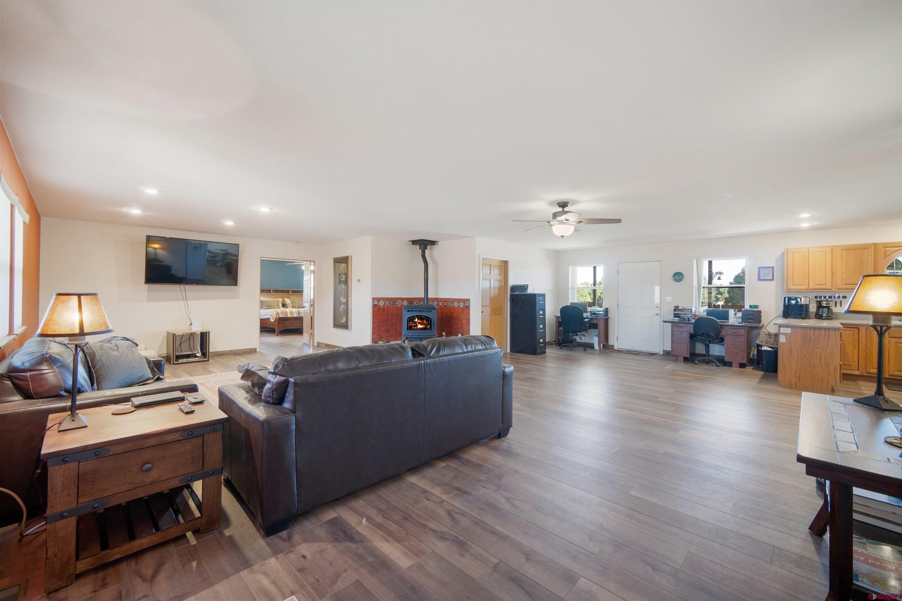 660 Road 8k Egnar, CO 81325 - Photo 6 of 30 a living room with furniture and a wooden floor